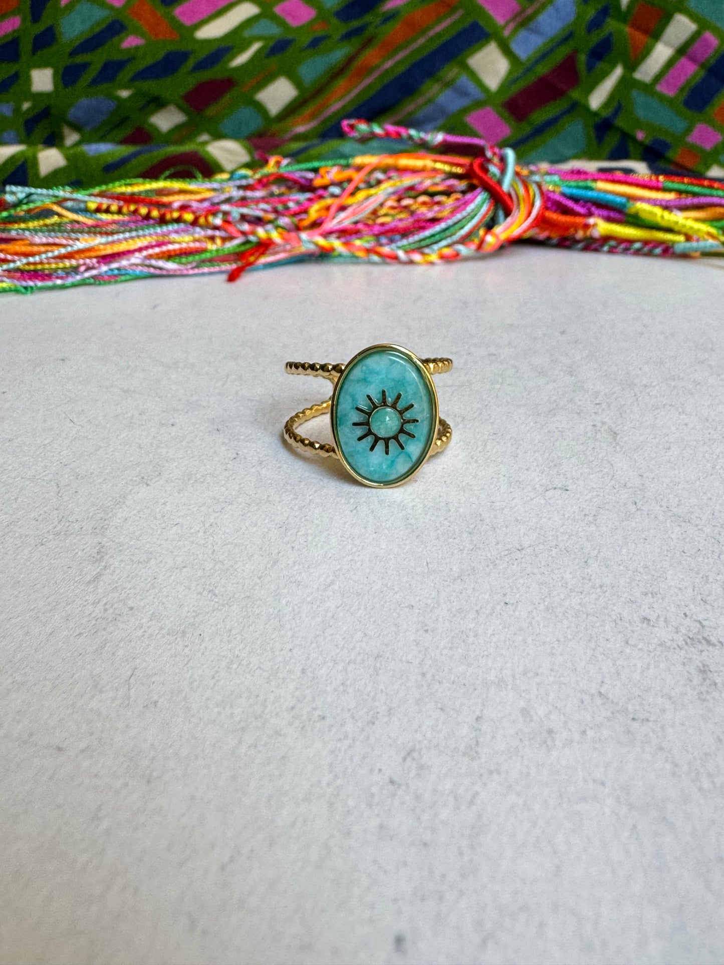 Turquoise golden steel ring