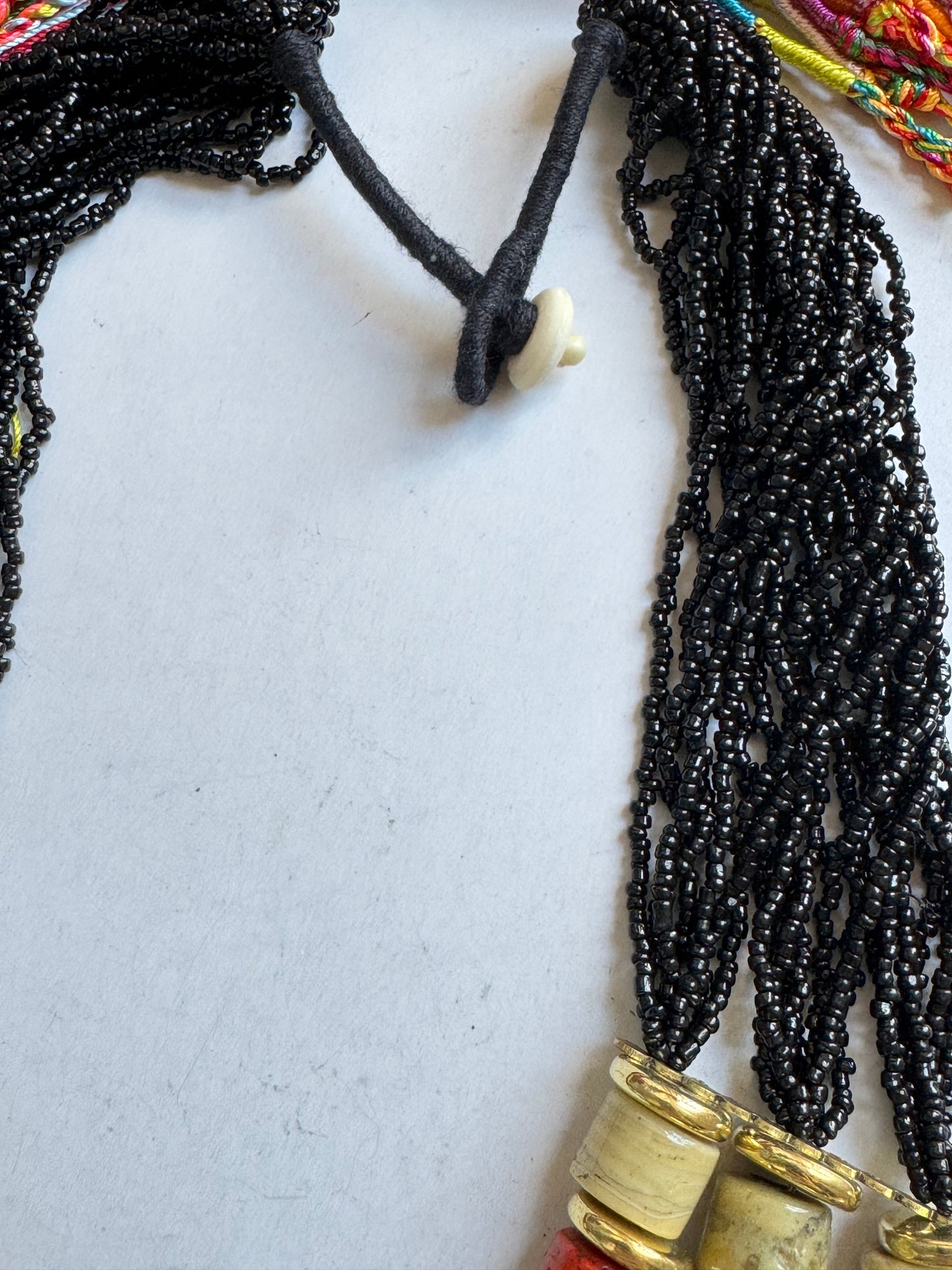 Multi-strand black beaded necklace