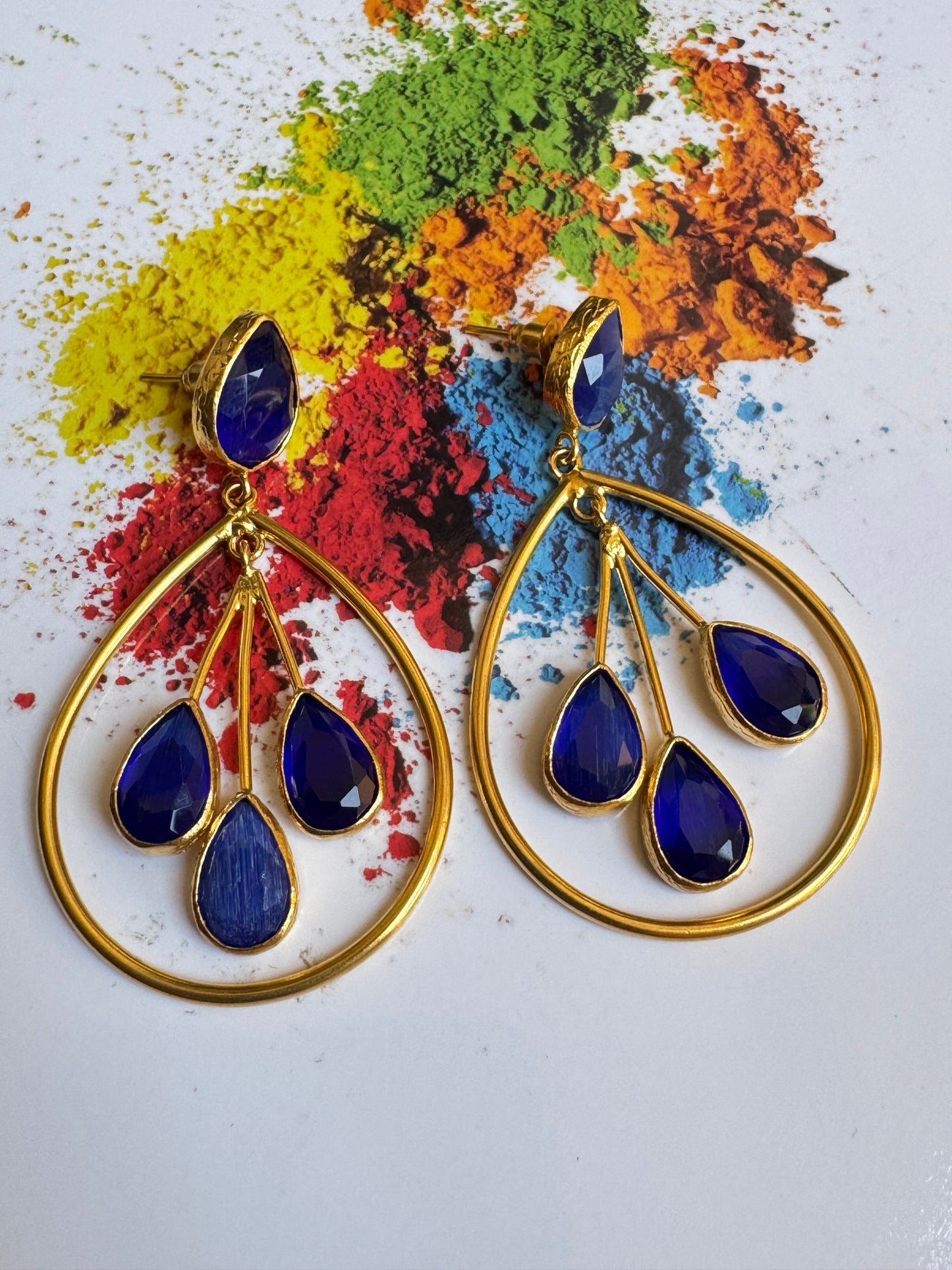 Three blue stone drop earrings