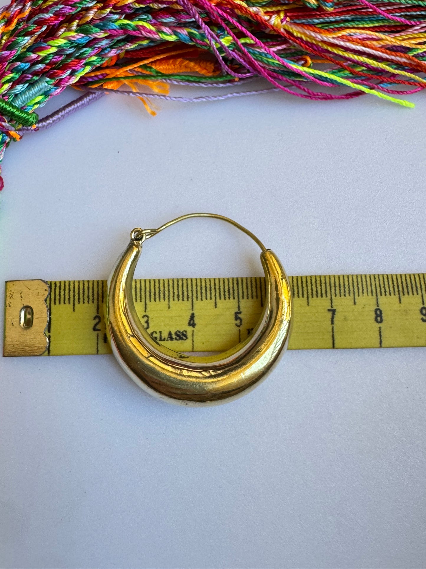 Large rounded golden boho earrings
