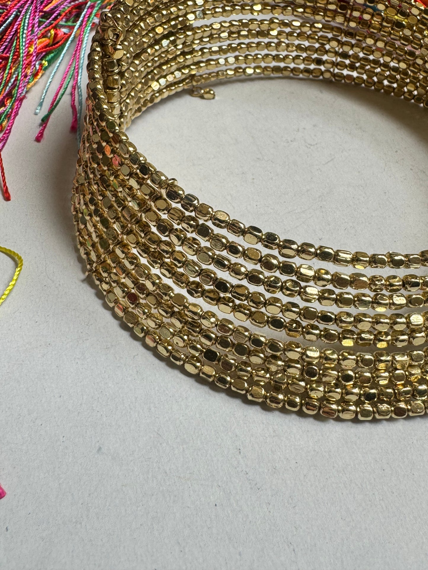 Multi-strand golden ball collar