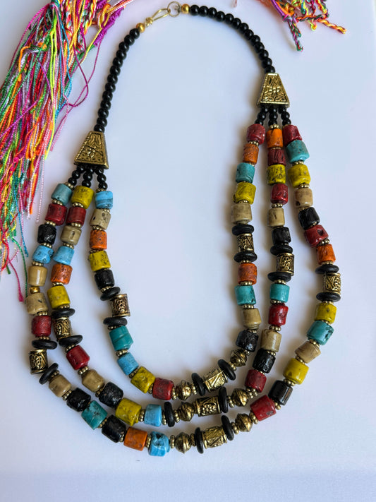 Multi-strand necklace with multicolored compasses
