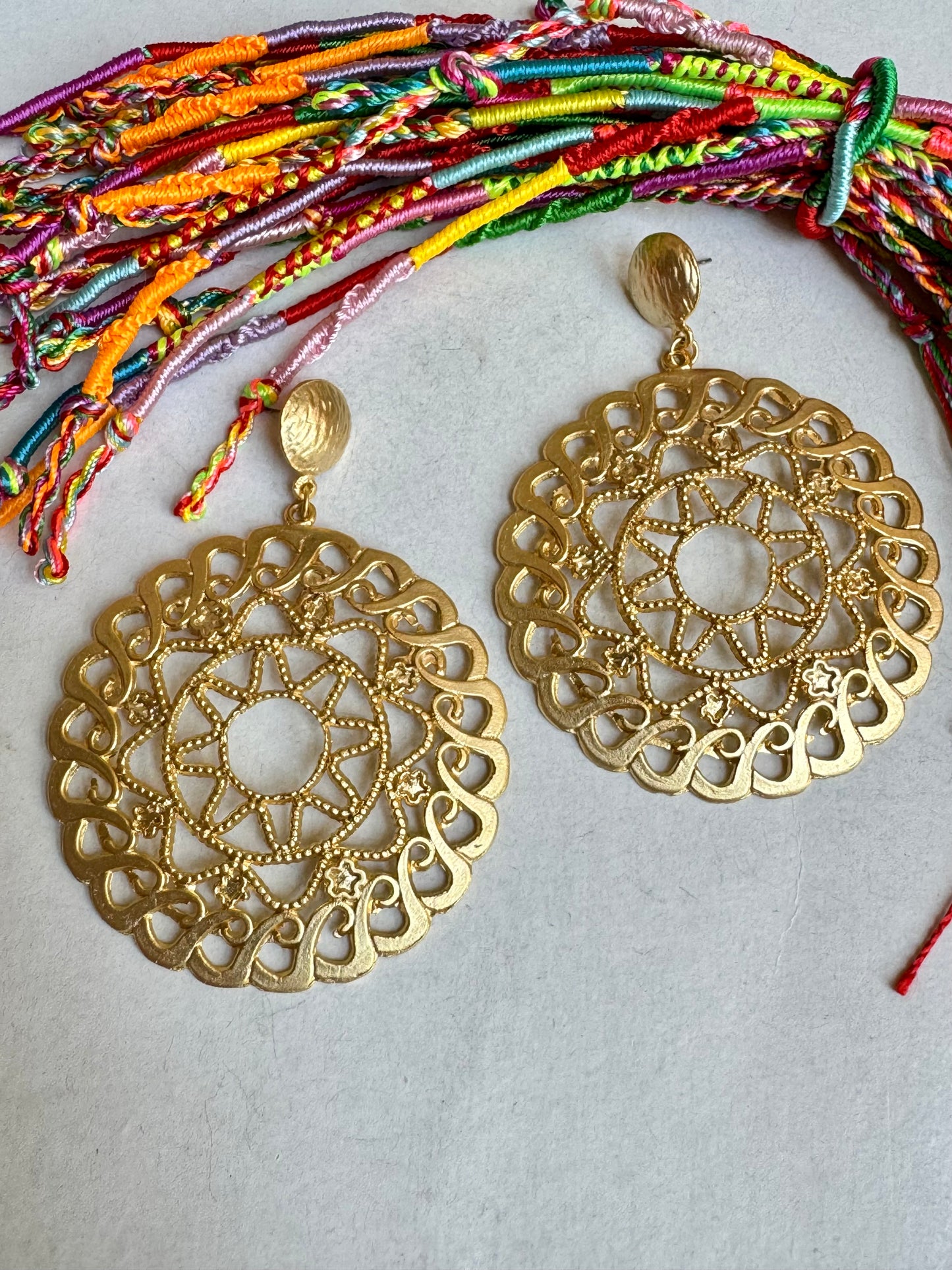 Golden pierced circle earrings