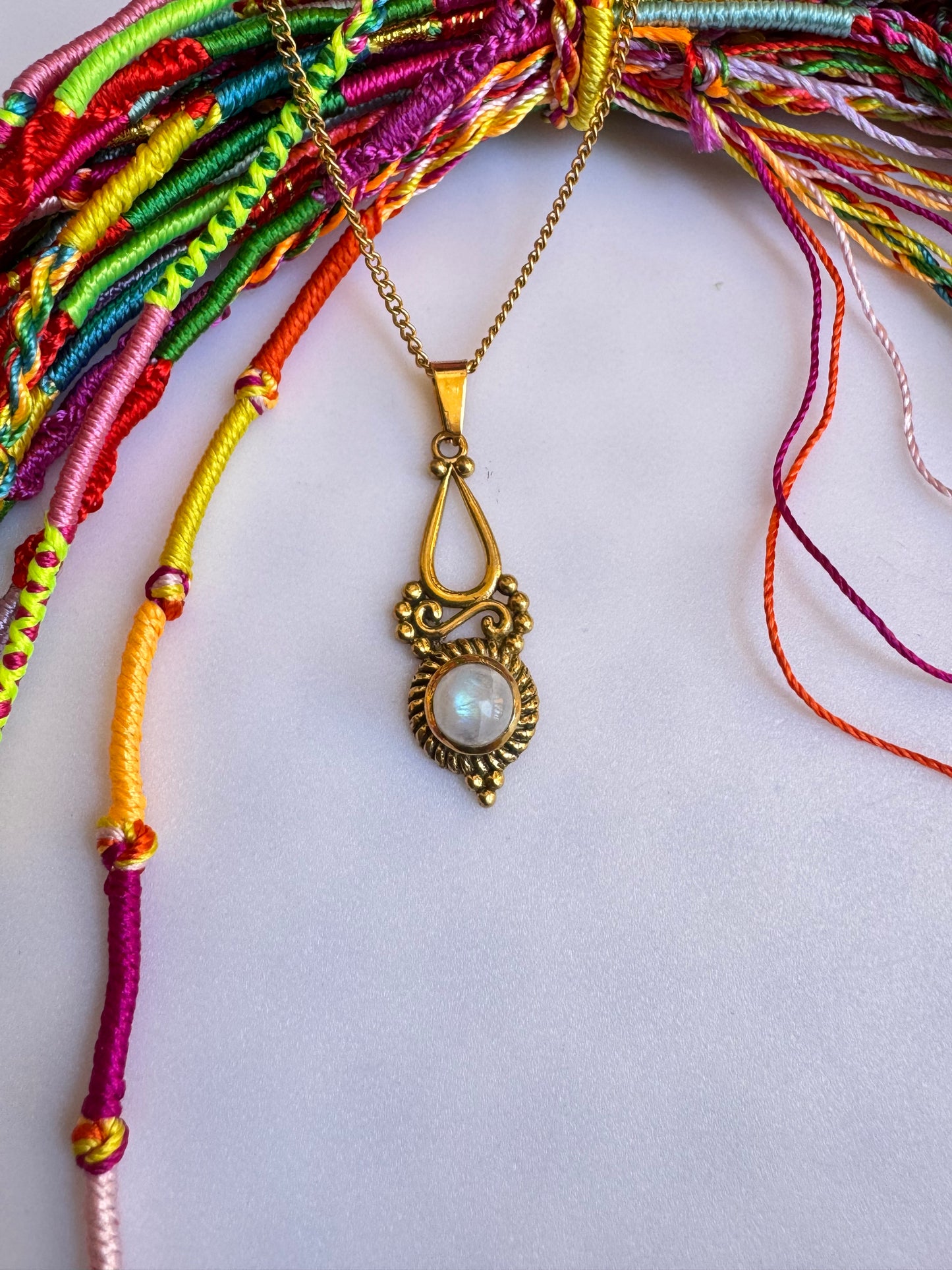 Golden necklace with moonstone pendant