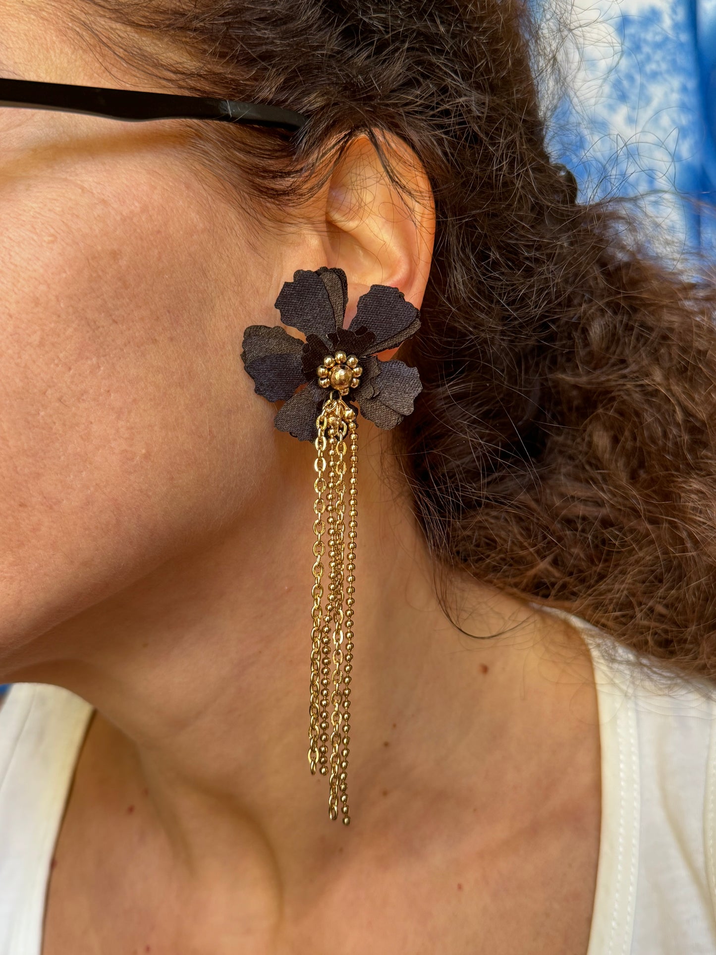 Golden pendant earrings with black fabric flower