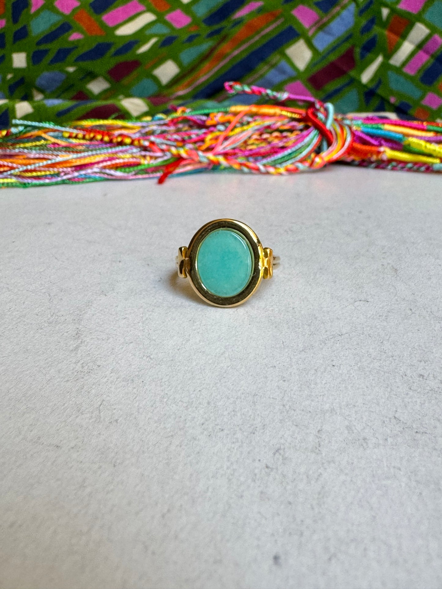 Turquoise golden steel ring