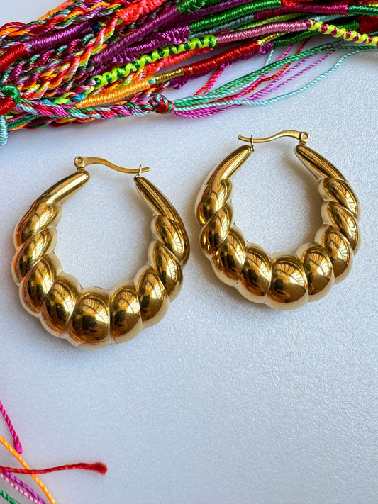 Gold plated steel earrings braided