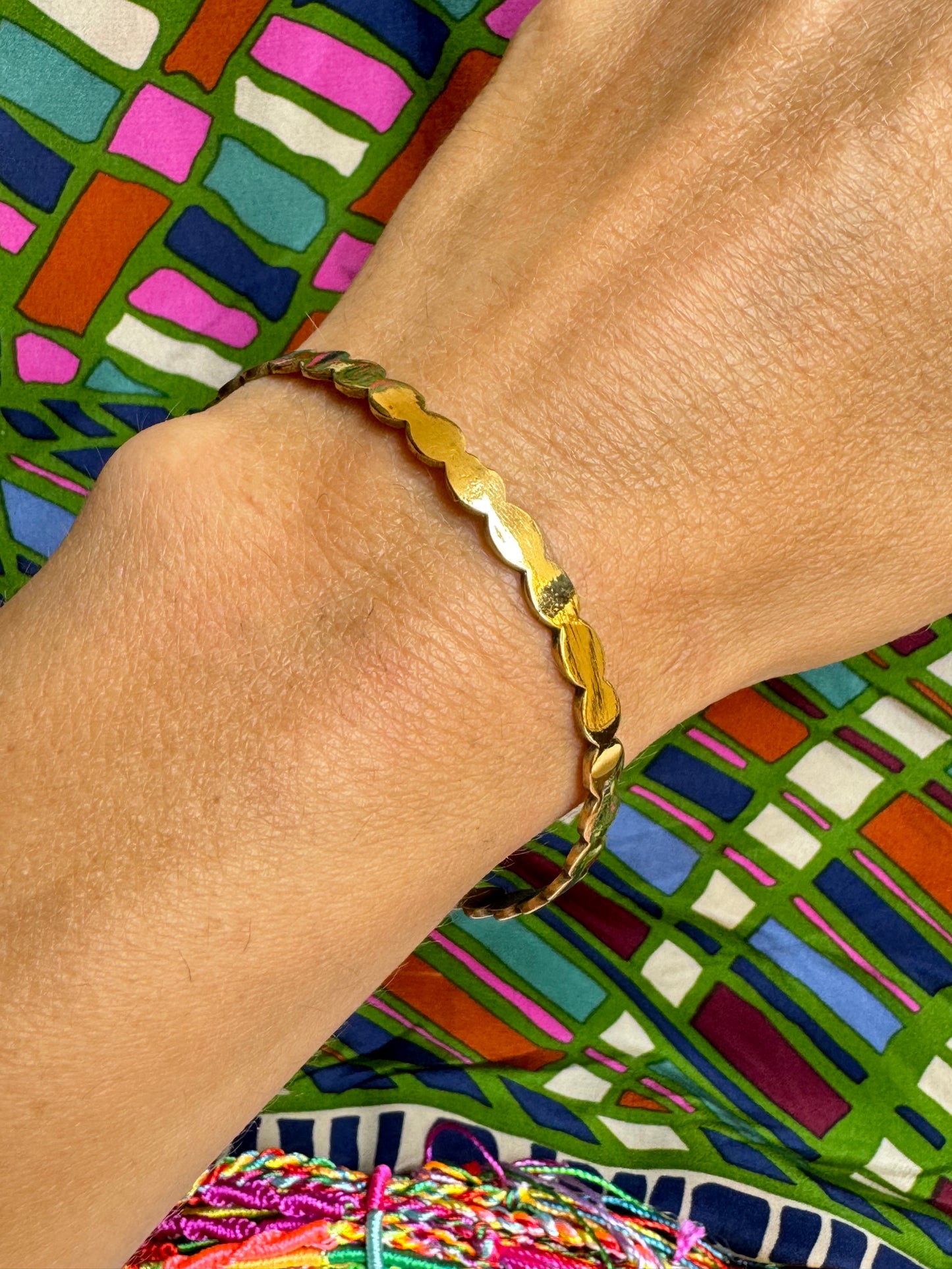 Thin golden waves bangle bracelet