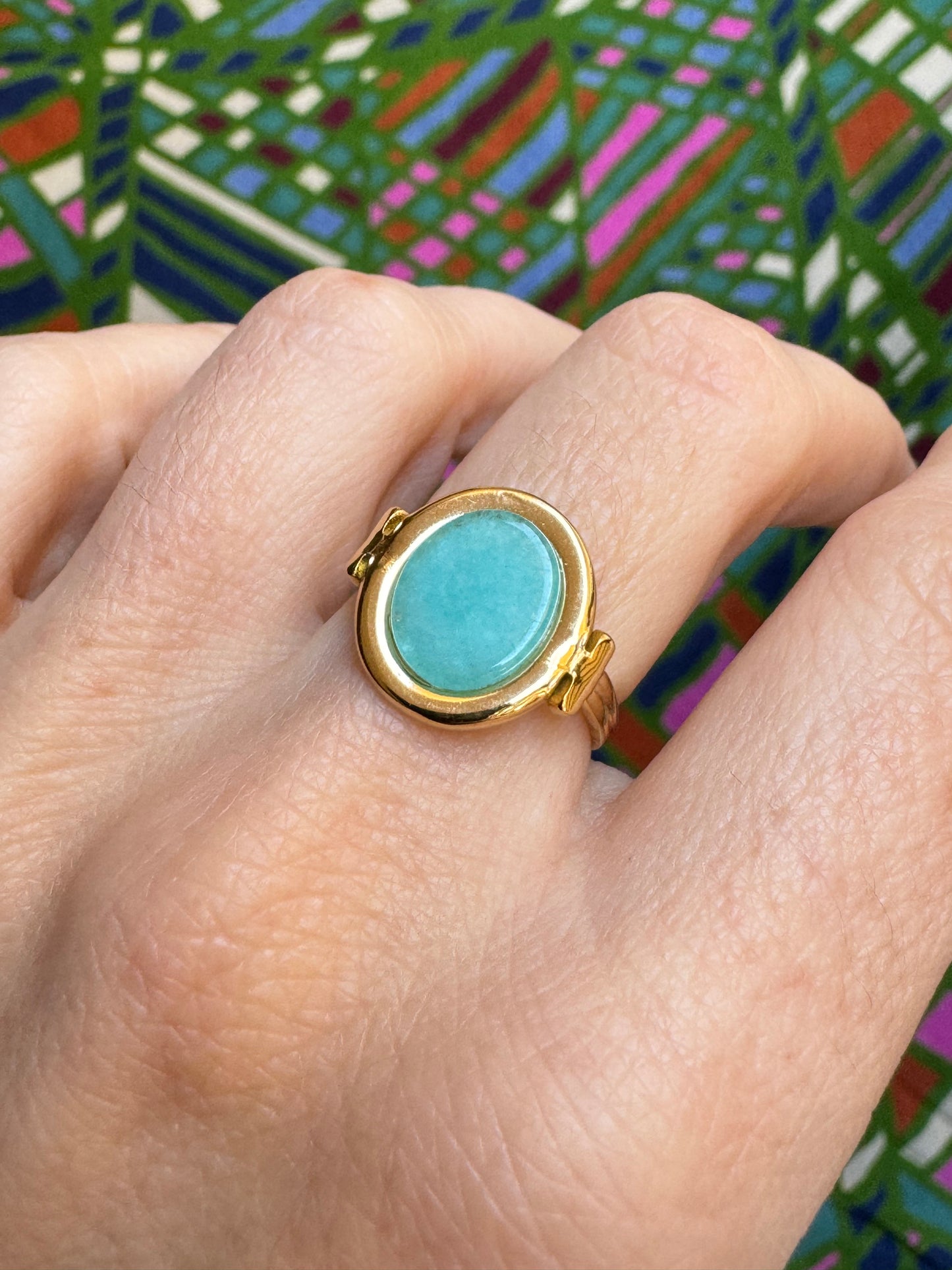 Turquoise golden steel ring