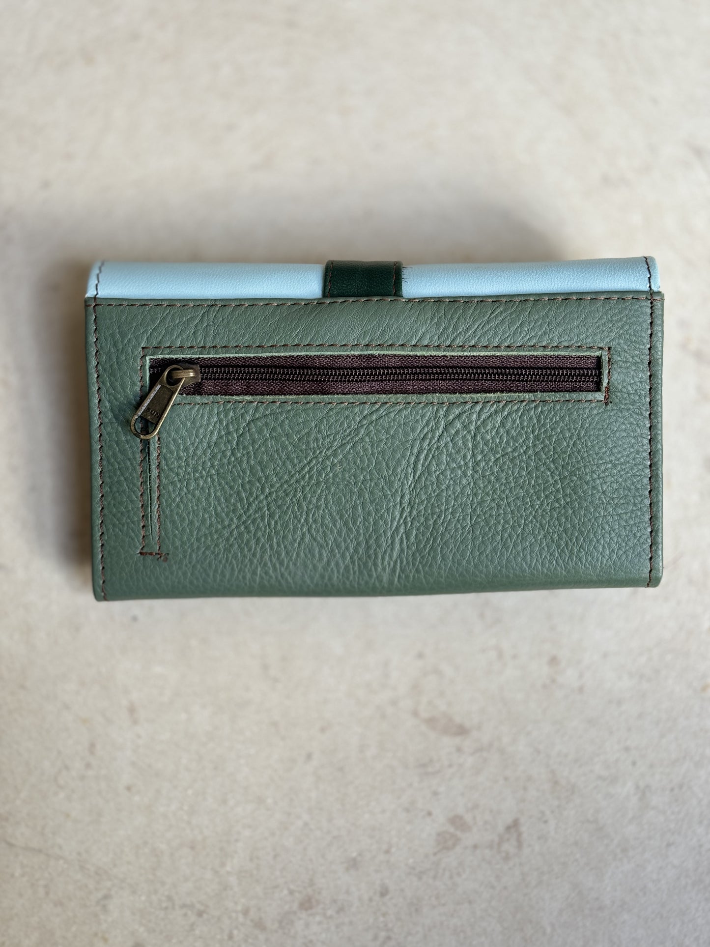 Light blue and green leather wallet