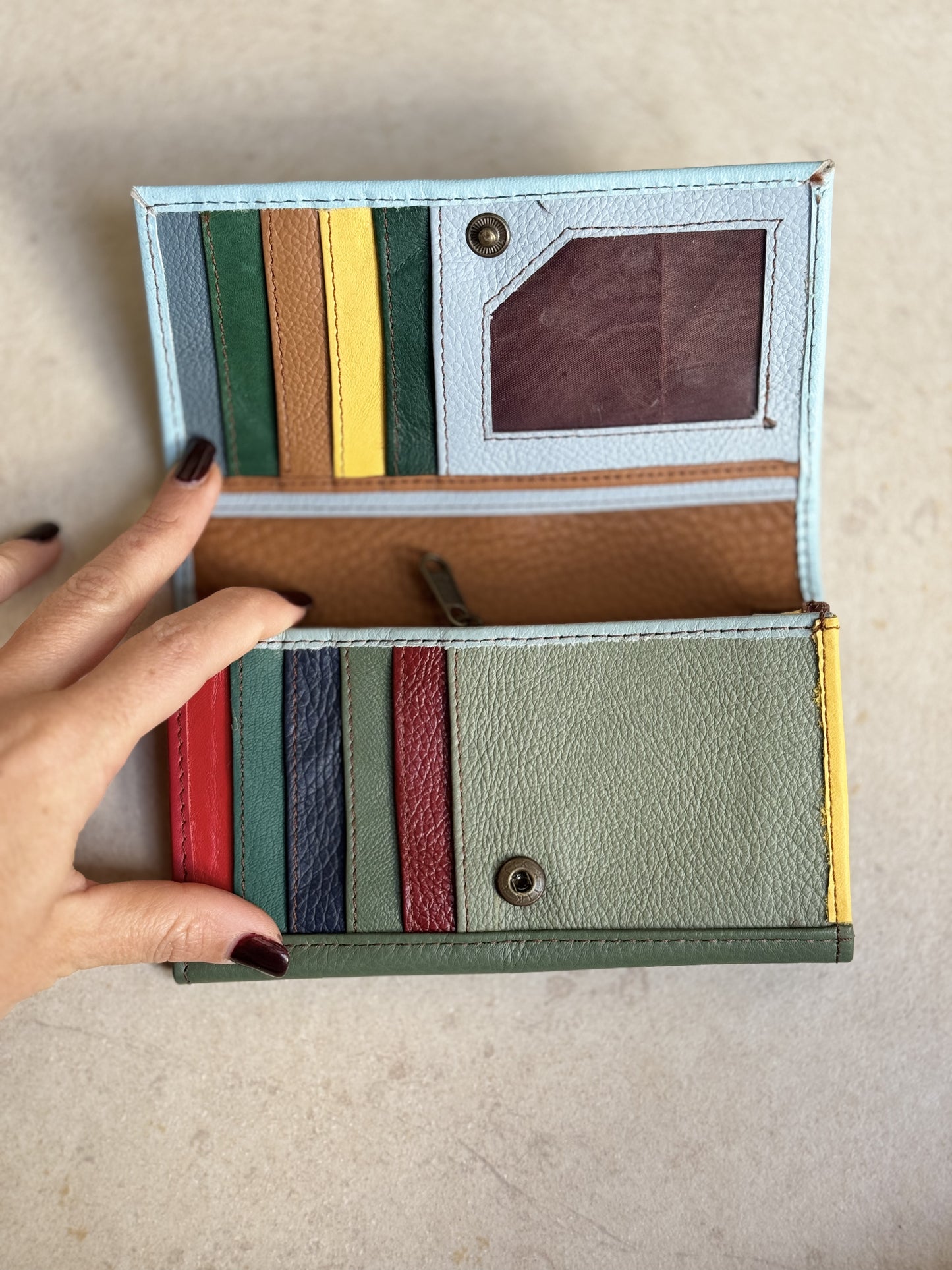 Light blue and green leather wallet