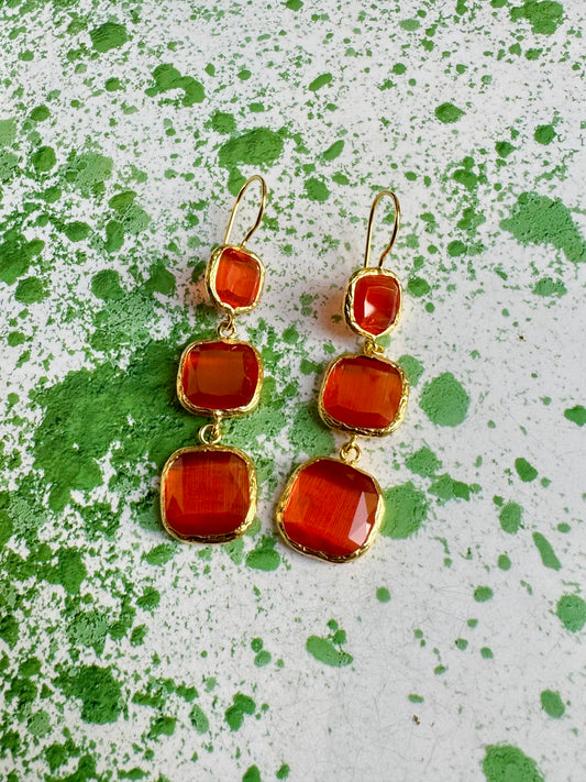 3 orange stone earrings