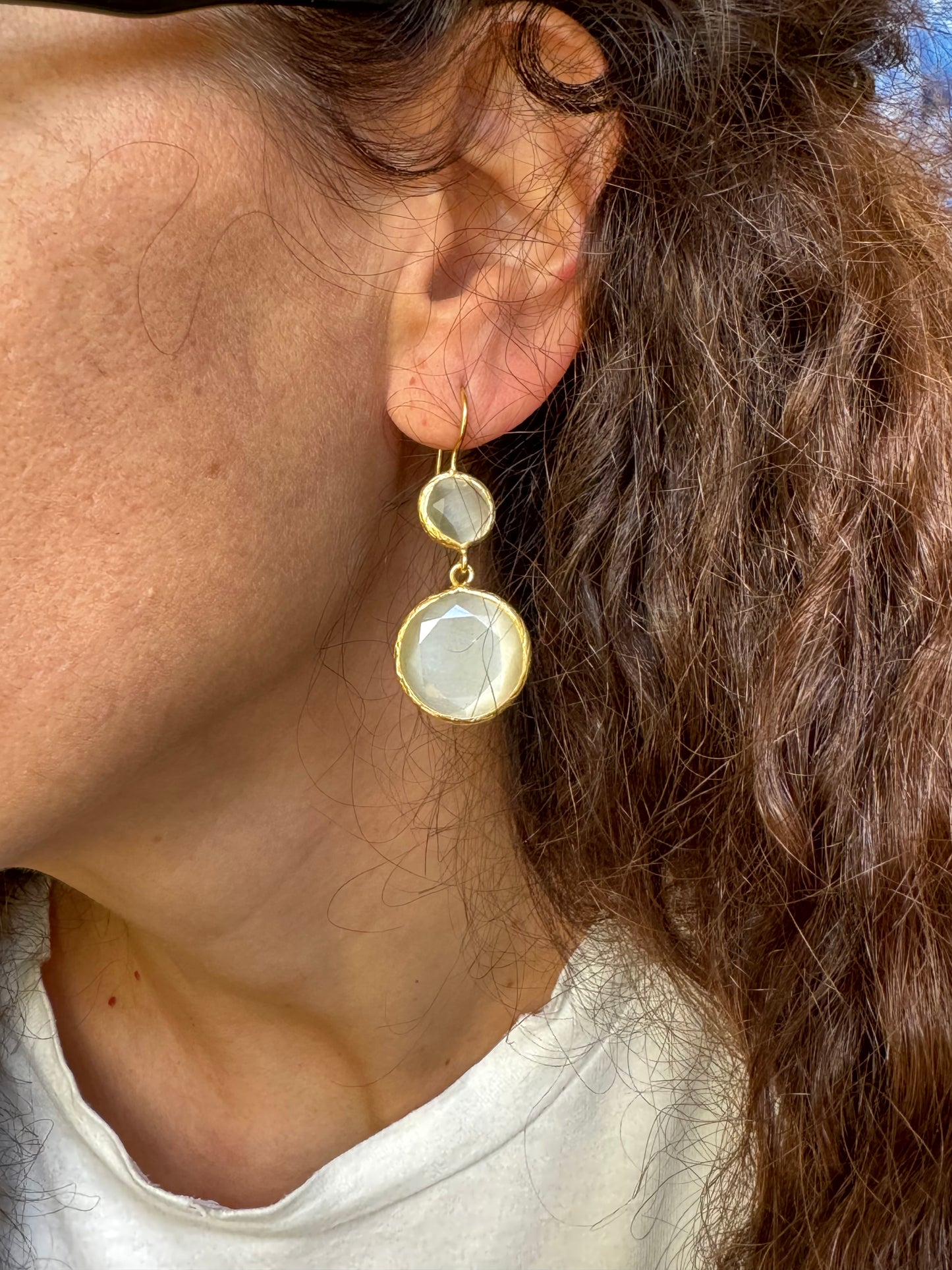 2 white stone earrings