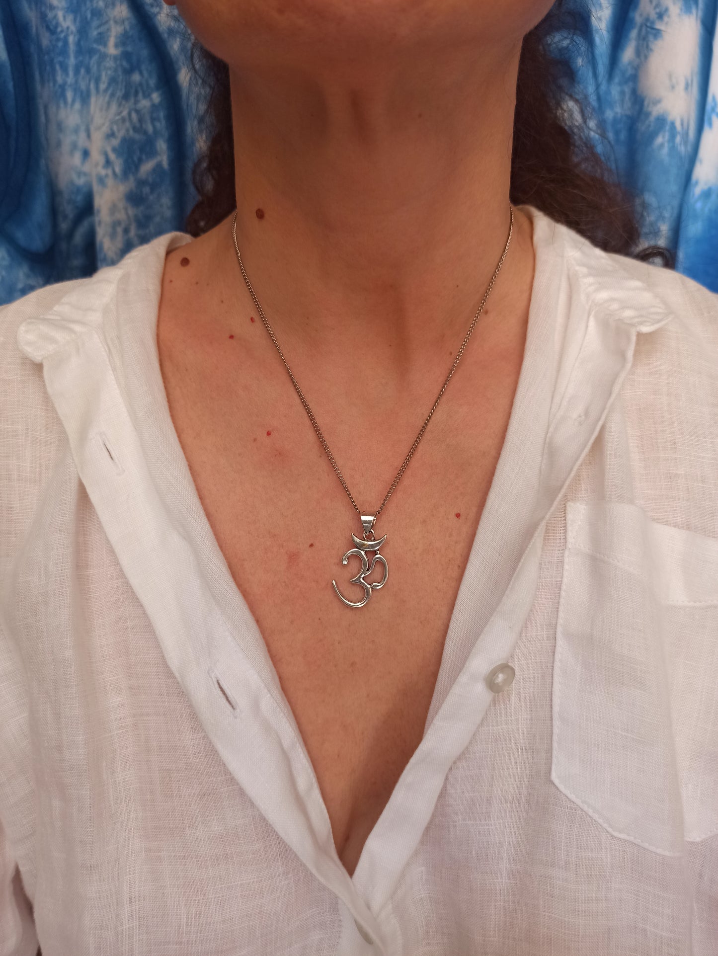 Silver necklace with ohm pendant