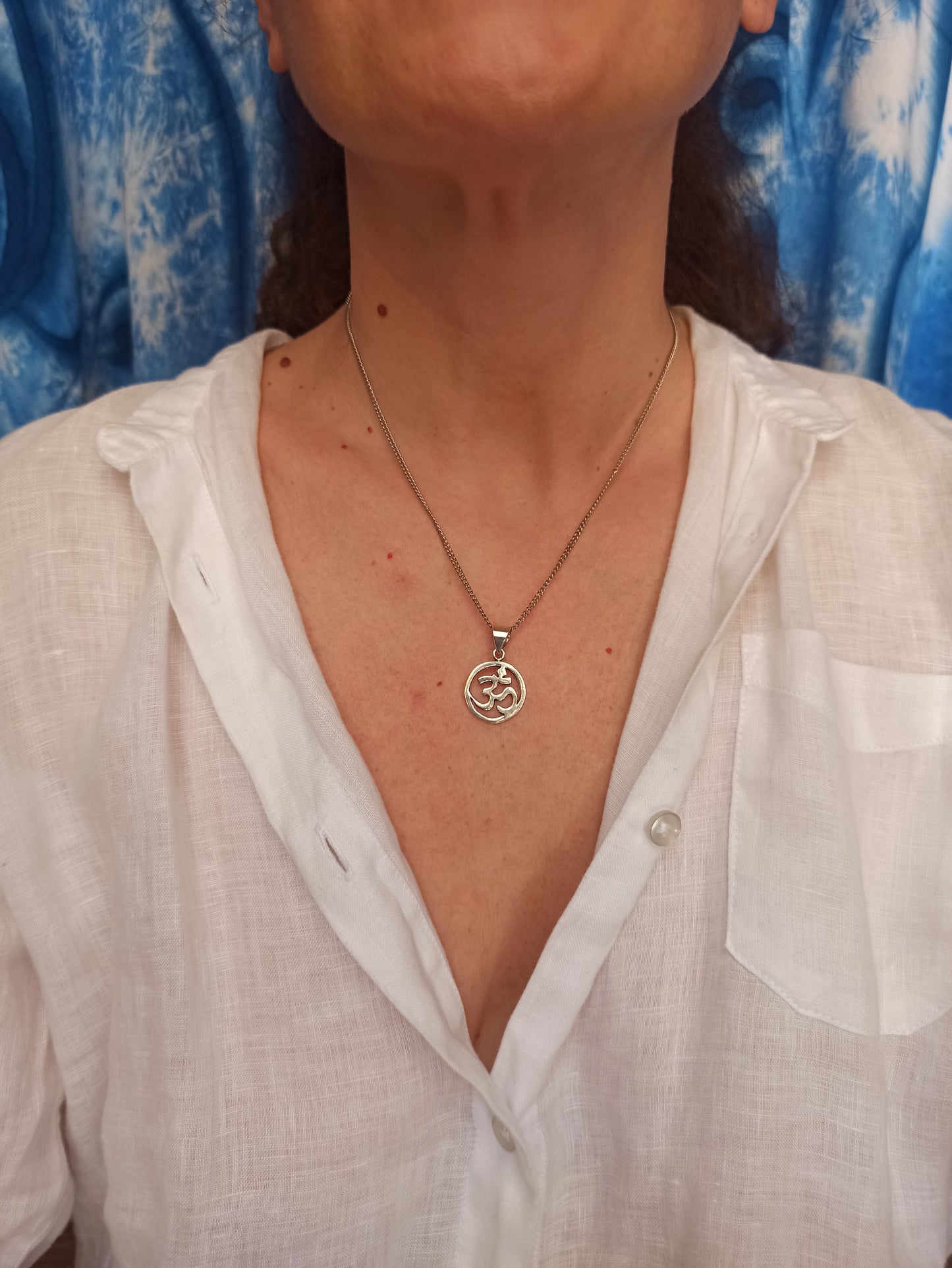 Silver necklace with ohm pendant