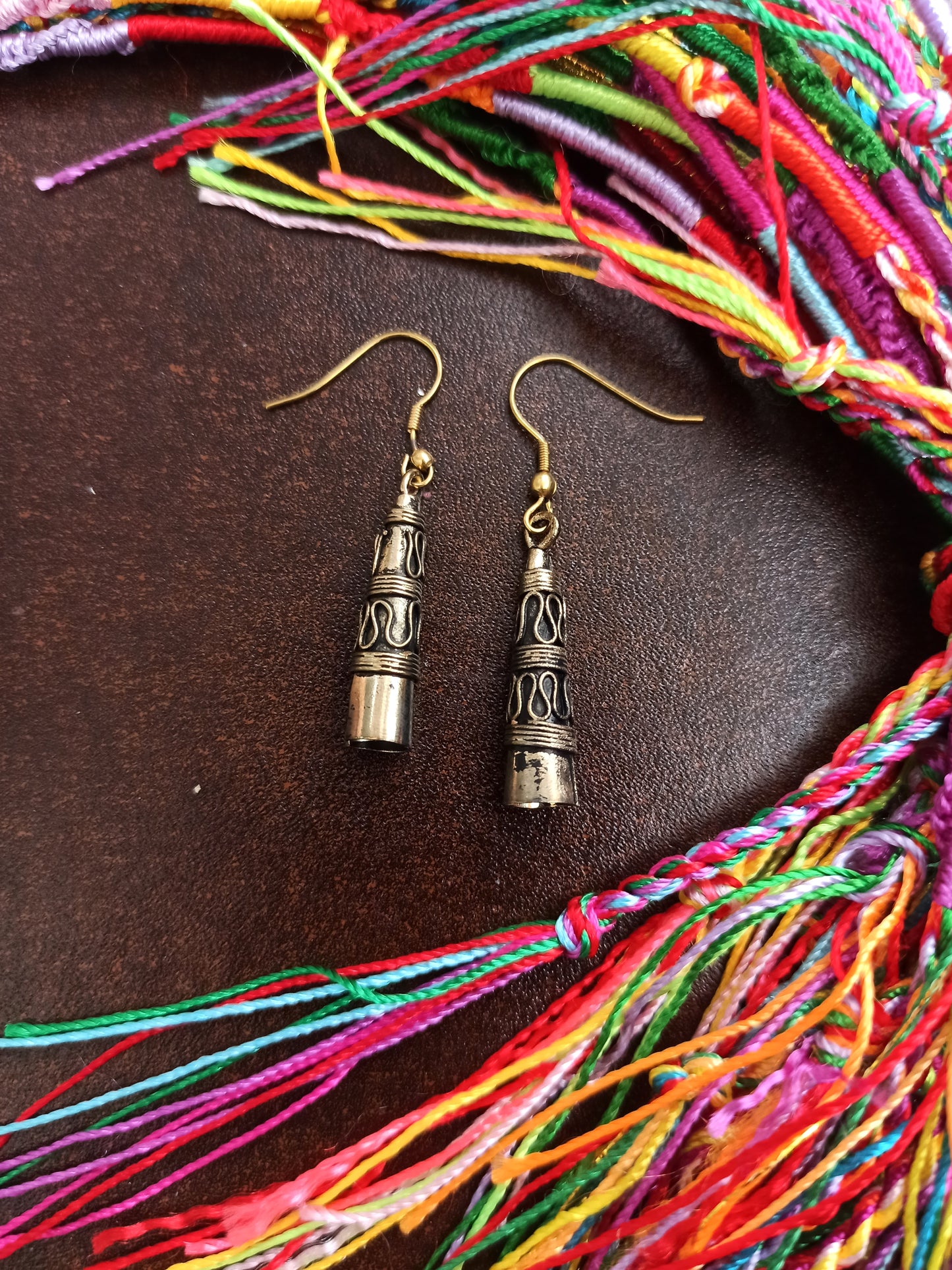 Golden boho cone earrings