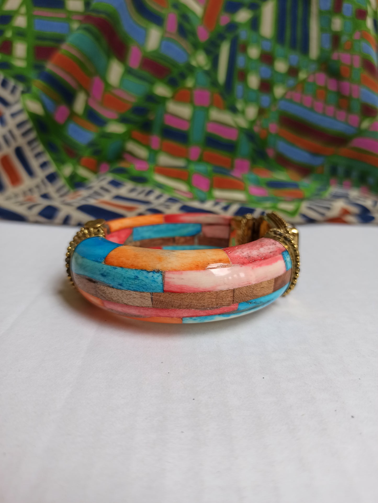 Large multicolored rigid bracelet with shaded black insert