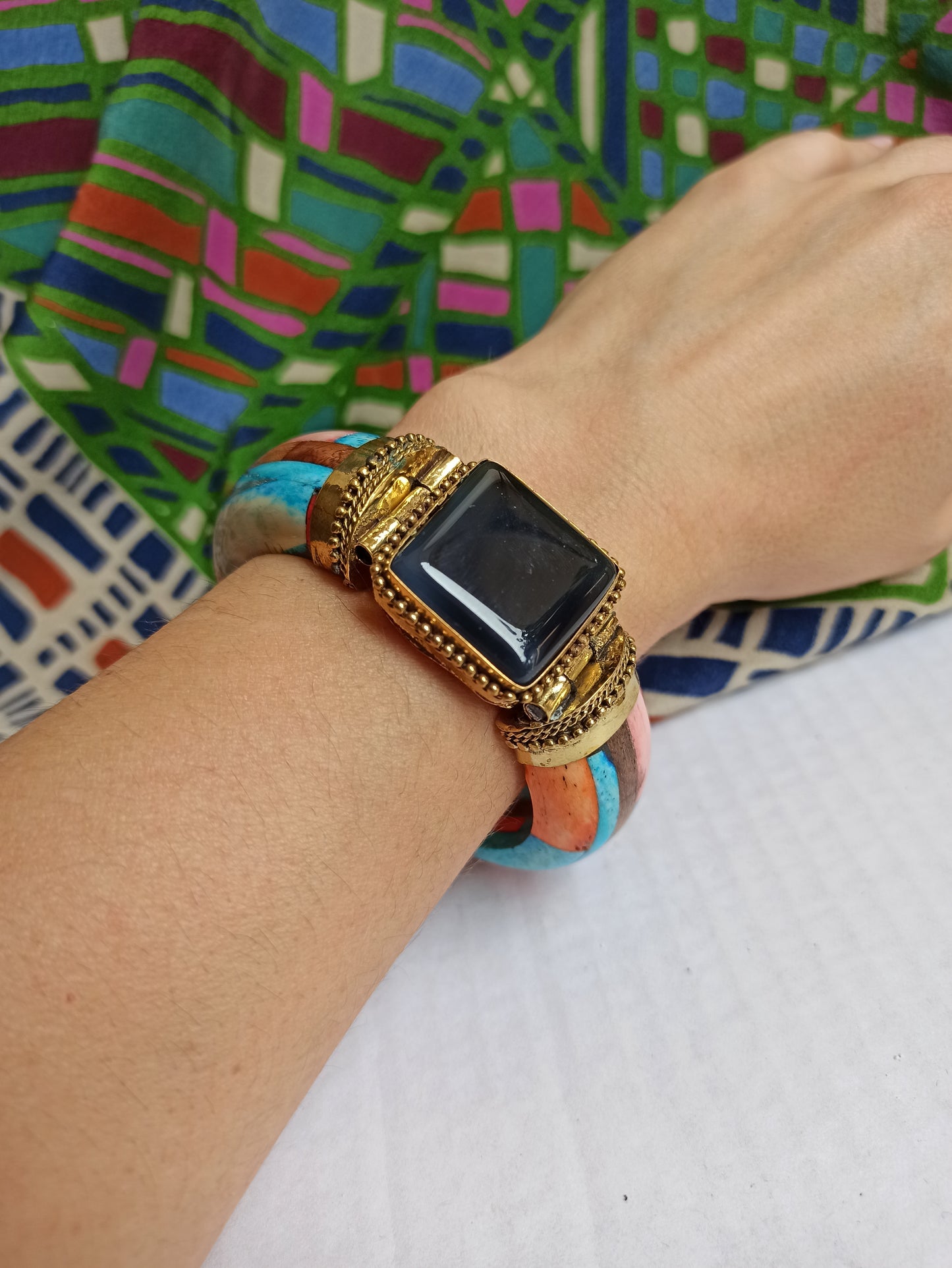 Large multicolored rigid bracelet with shaded black insert