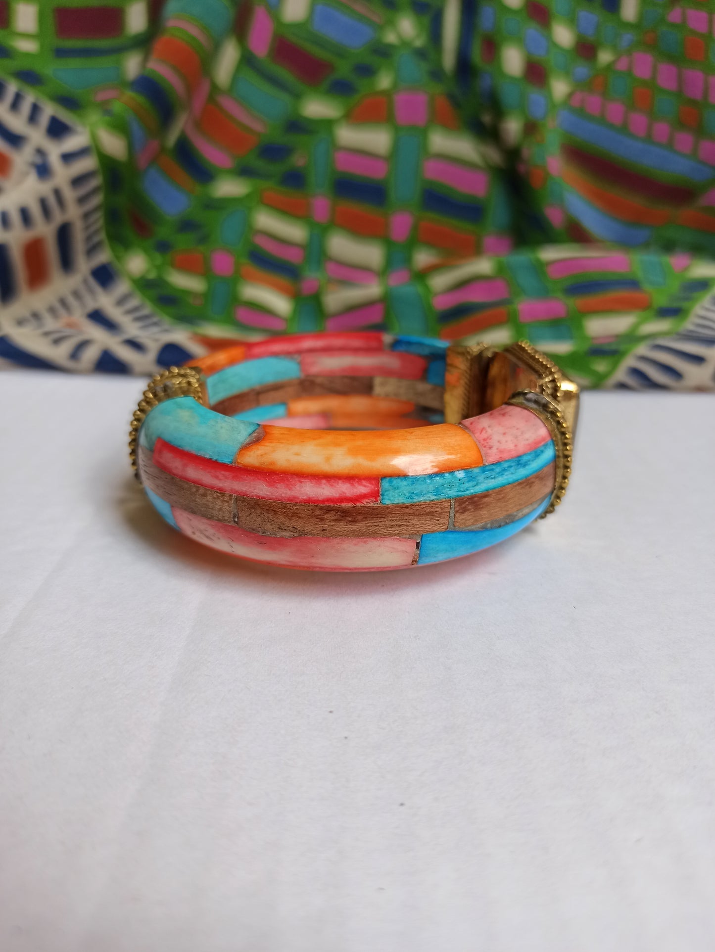 Large multicolored rigid bracelet with beige insert