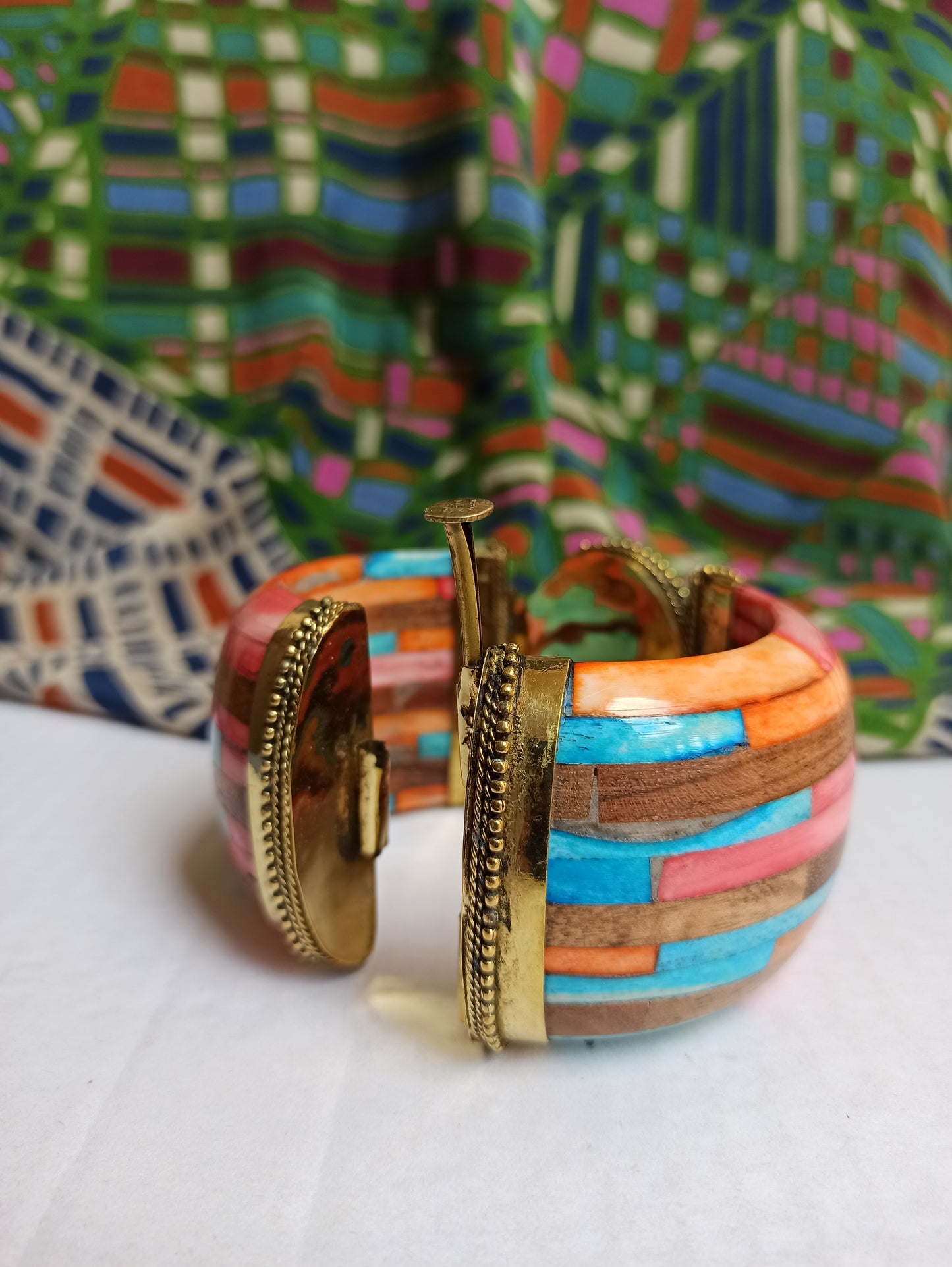 Large multicolored rigid bracelet with amber insert