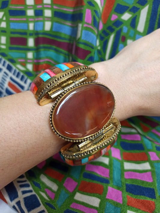 Large multicolored rigid bracelet with amber insert