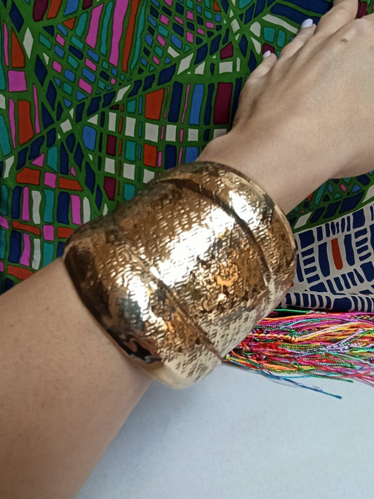 Domed golden bangle bracelet