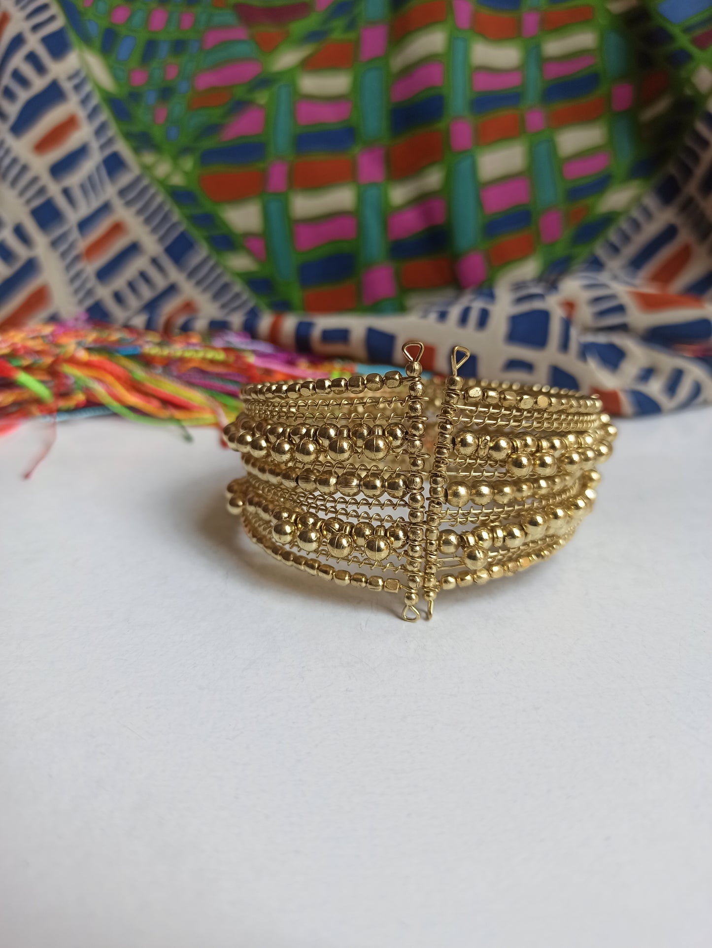 Multi-strand golden ball bracelet