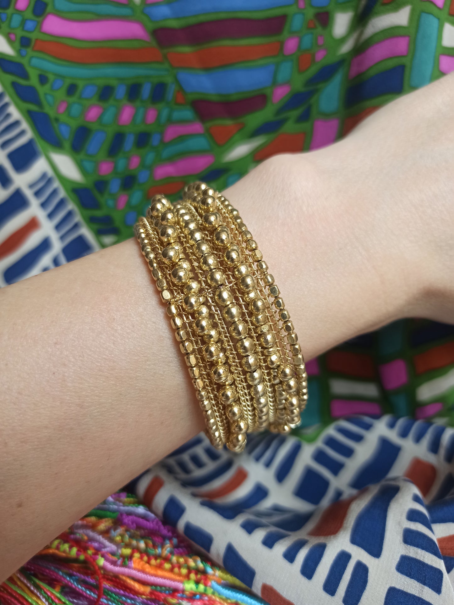 Multi-strand golden ball bracelet