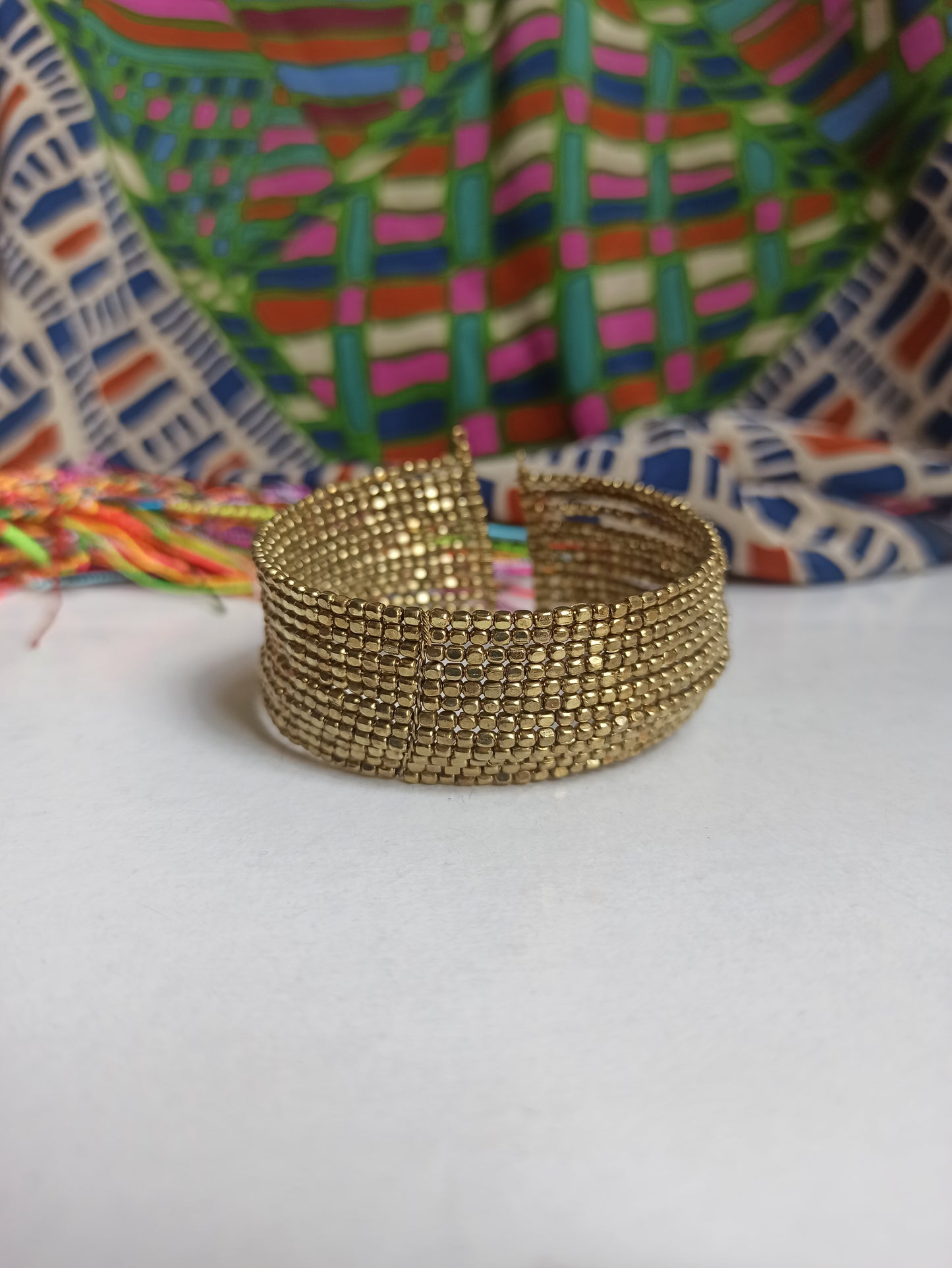 Multi-strand golden ball bracelet