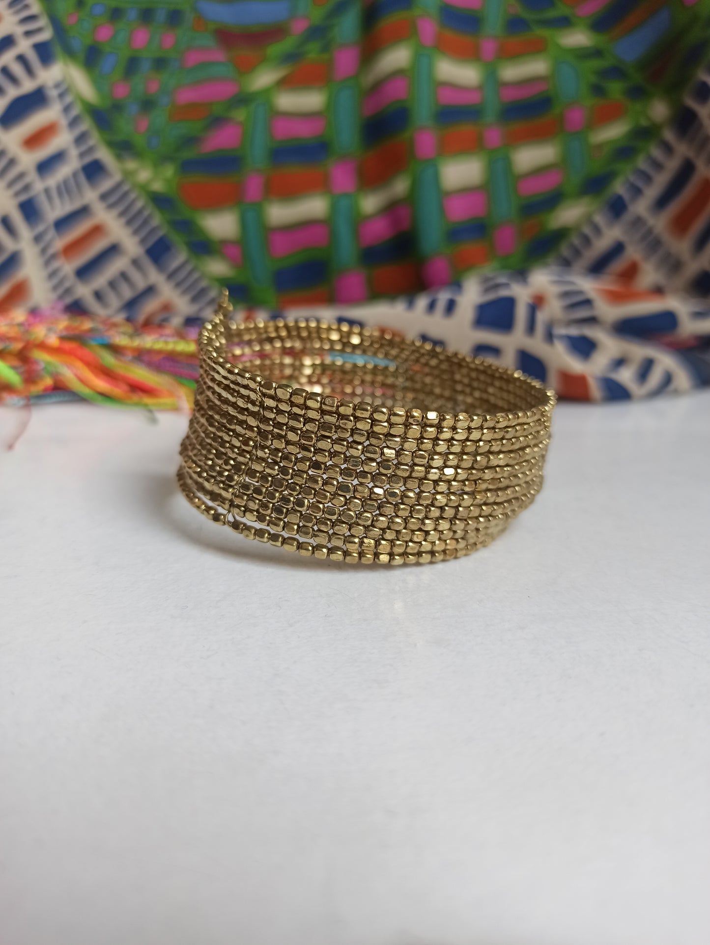 Multi-strand golden ball bracelet