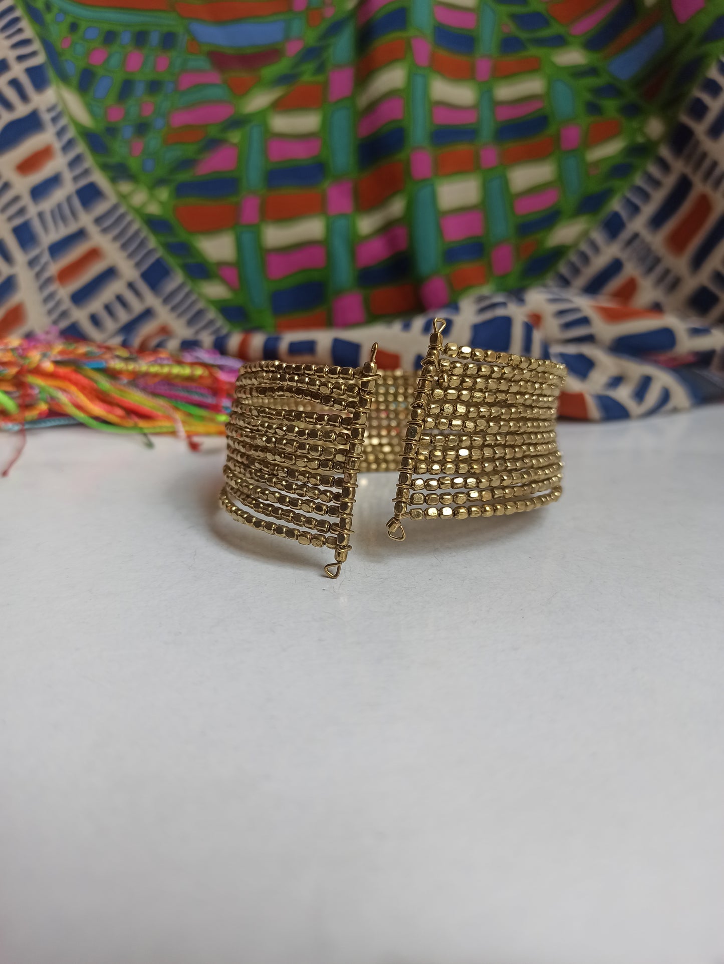 Multi-strand golden ball bracelet