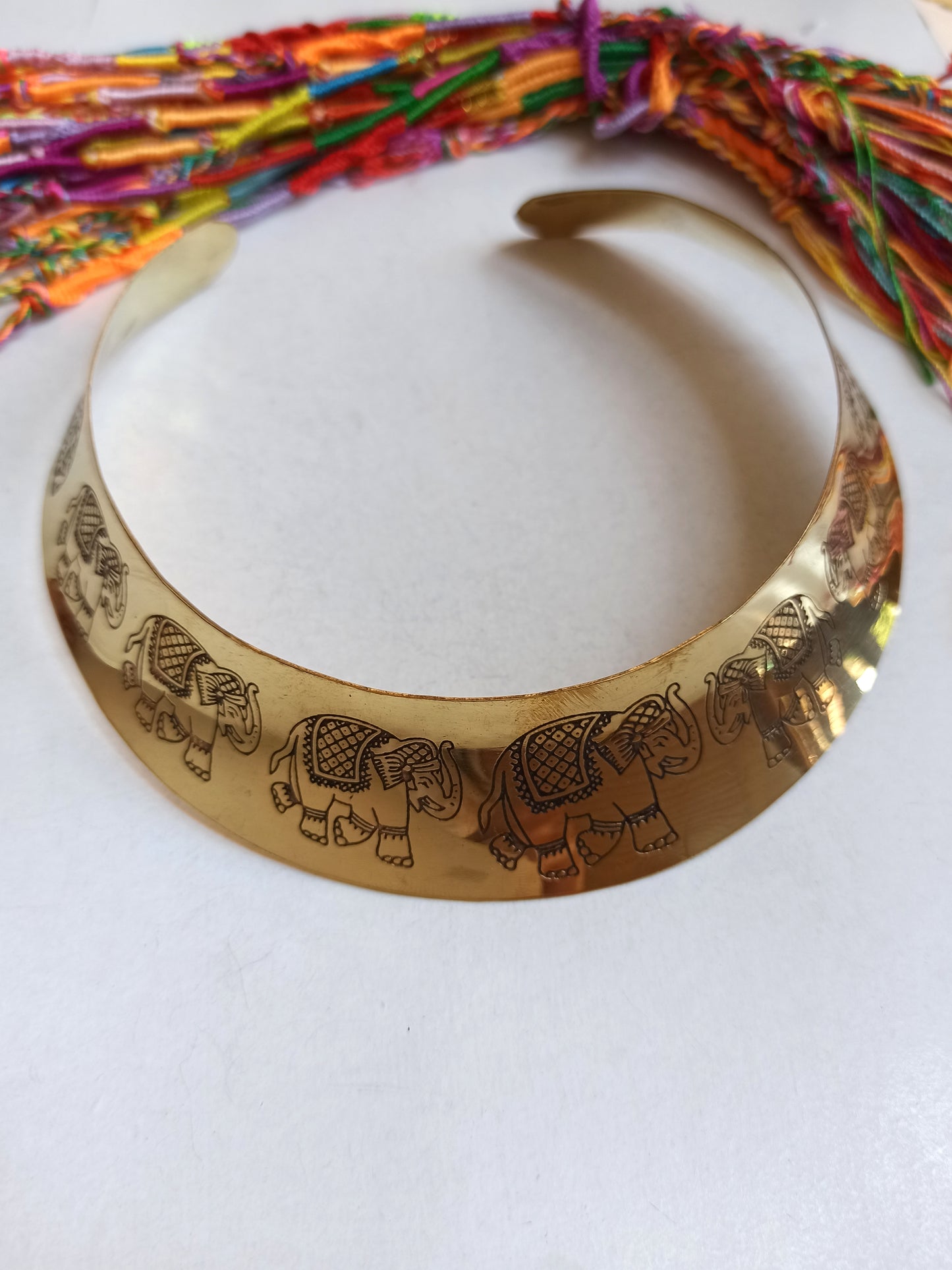 Tall golden elephant collar