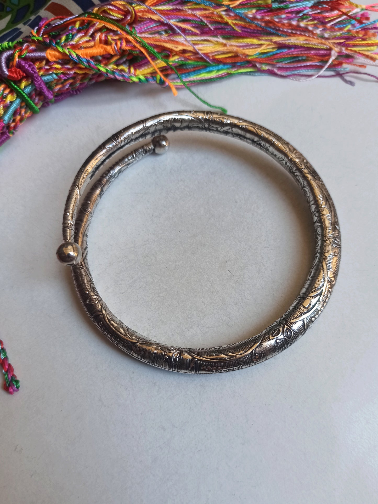 Double worked silver arm bracelet