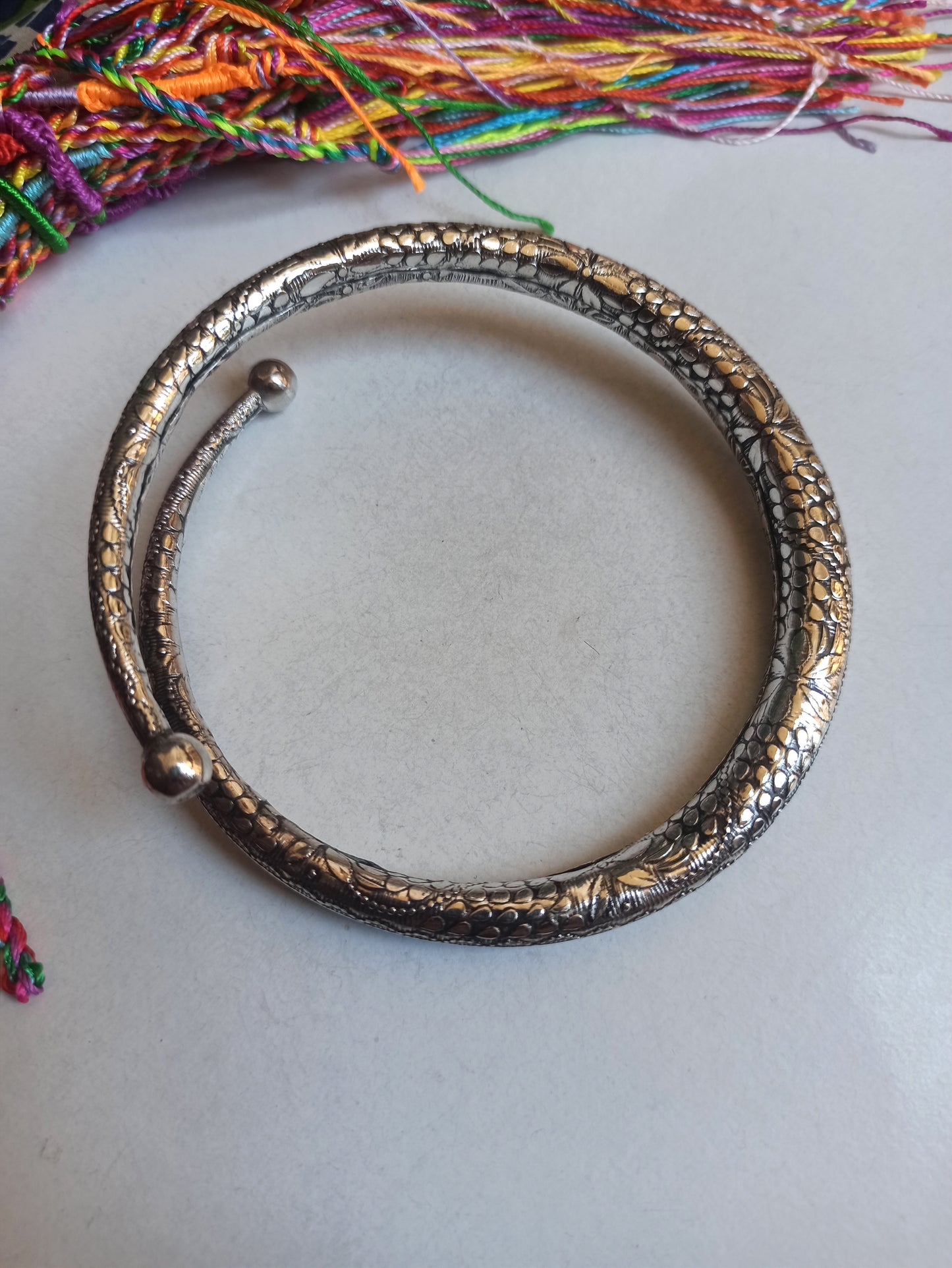 Double worked silver arm bracelet