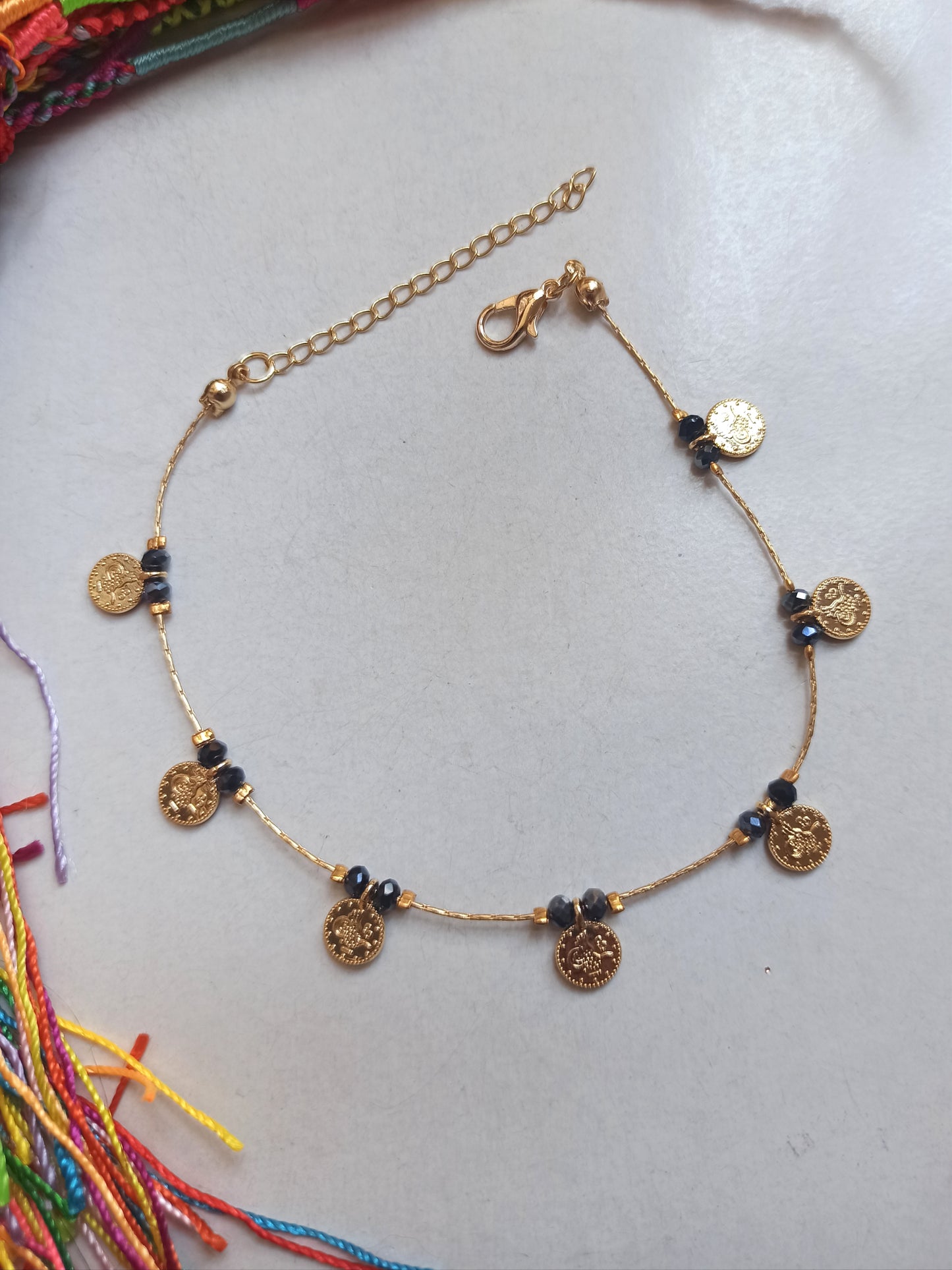 Anthracite beaded anklet + golden coins