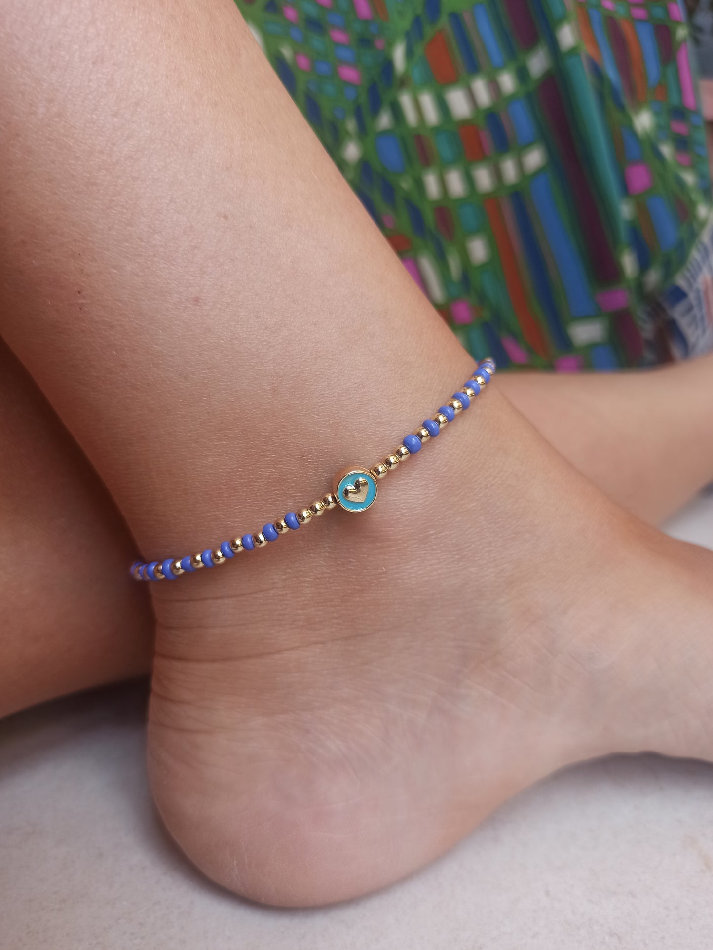 Golden anklet with little heart and blue beads