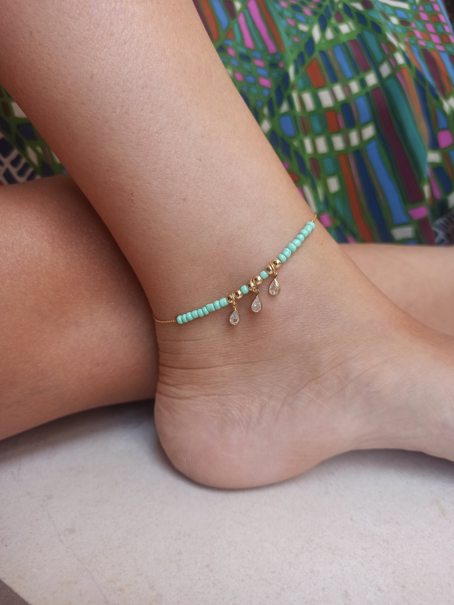 Golden anklet 3 lights green beads