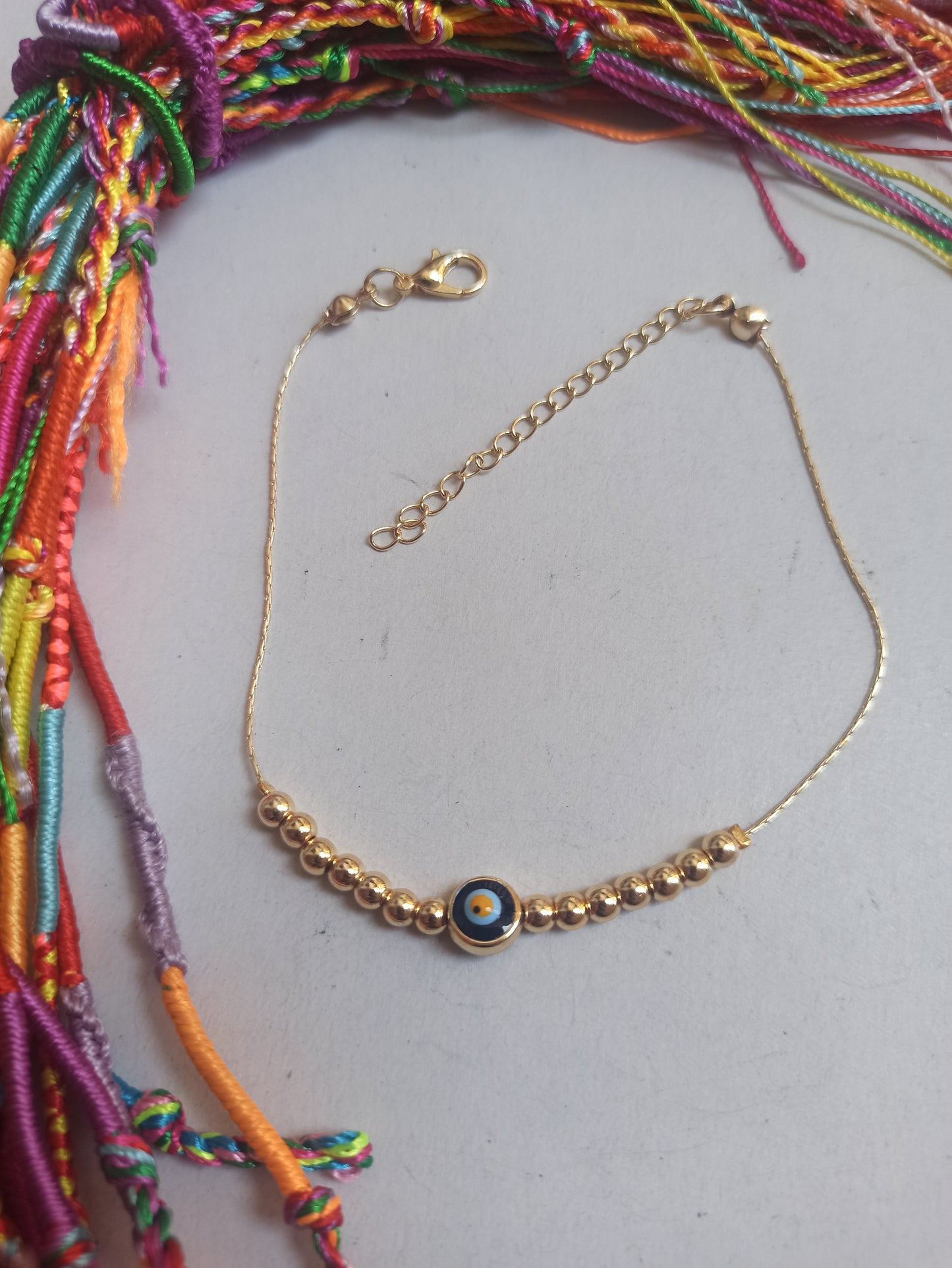 Golden eyelet anklet