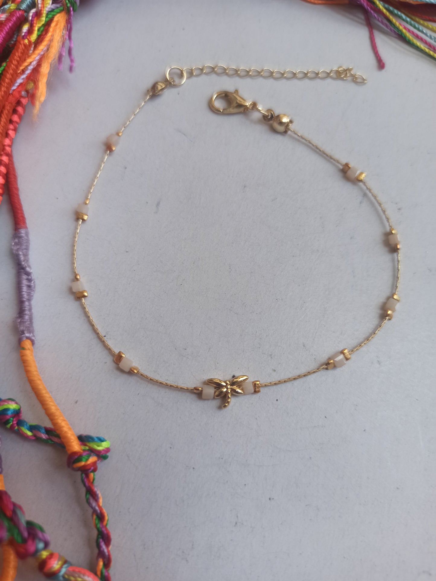 Golden dragonfly anklet with pale pink beads