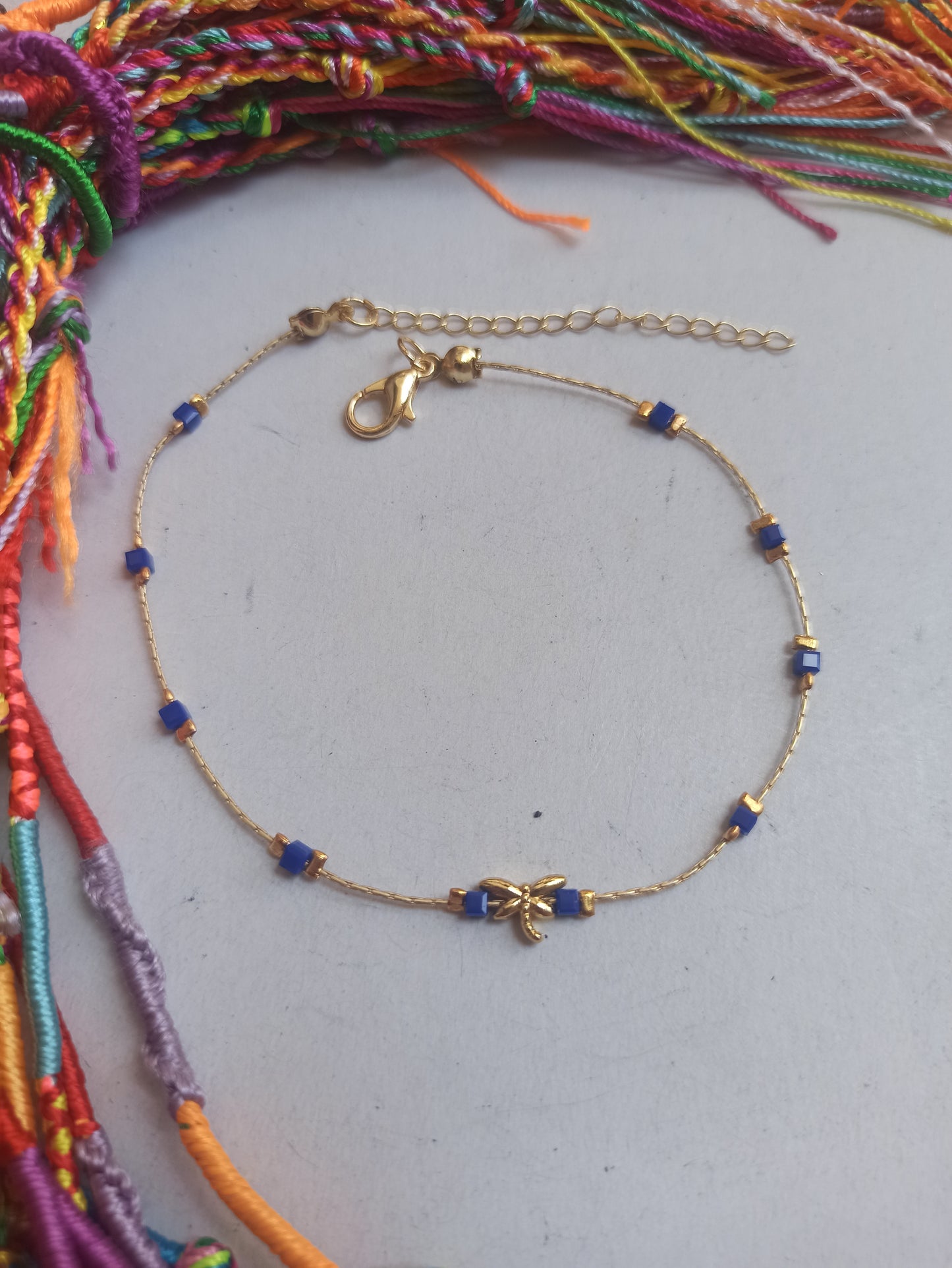 Golden dragonfly anklet with blue beads