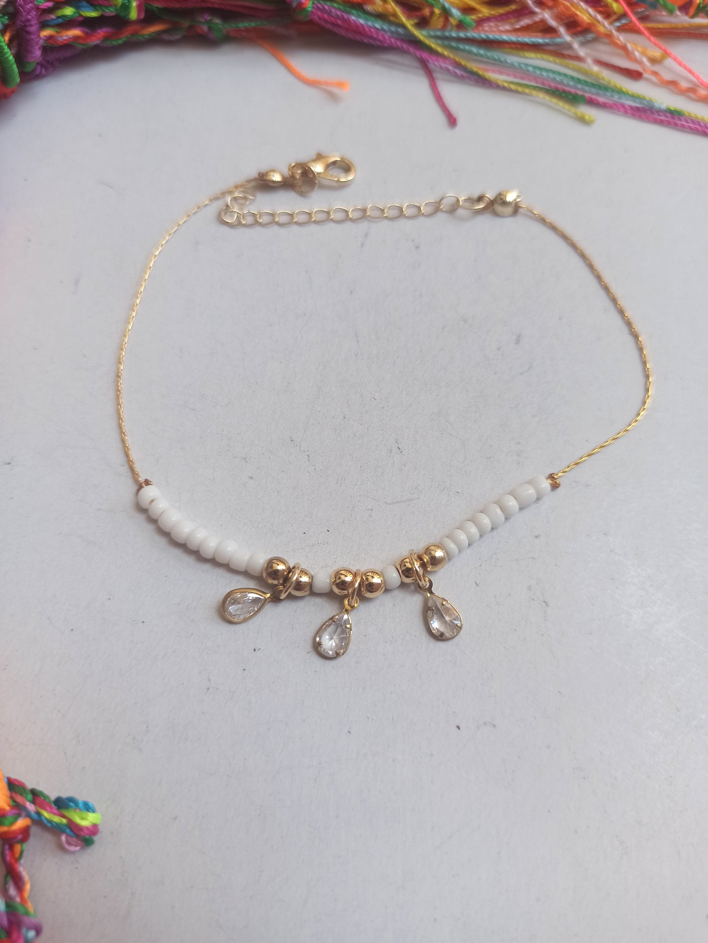 Golden anklet 3 lights white beads