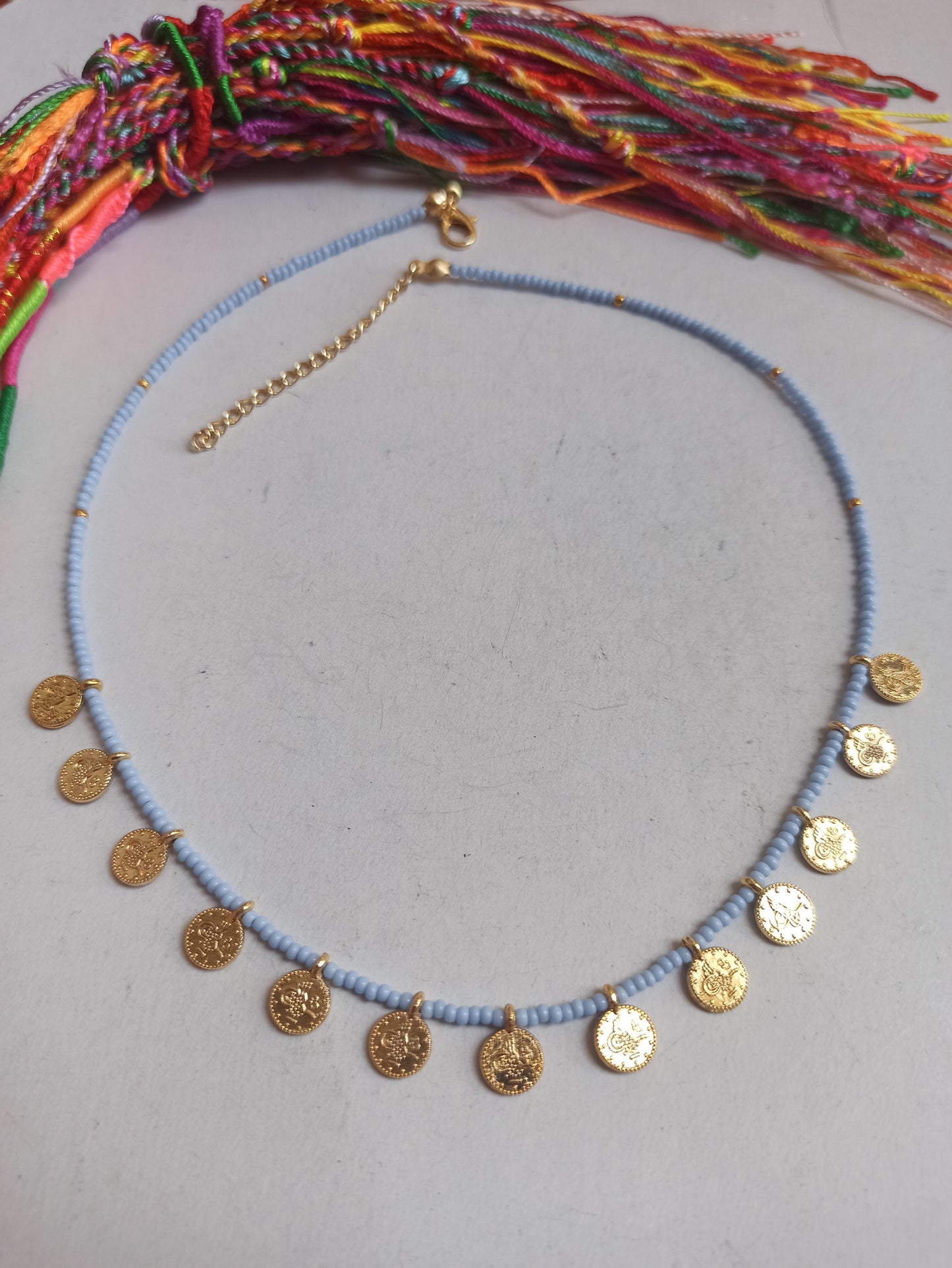 Thin necklace with lilac coin beads