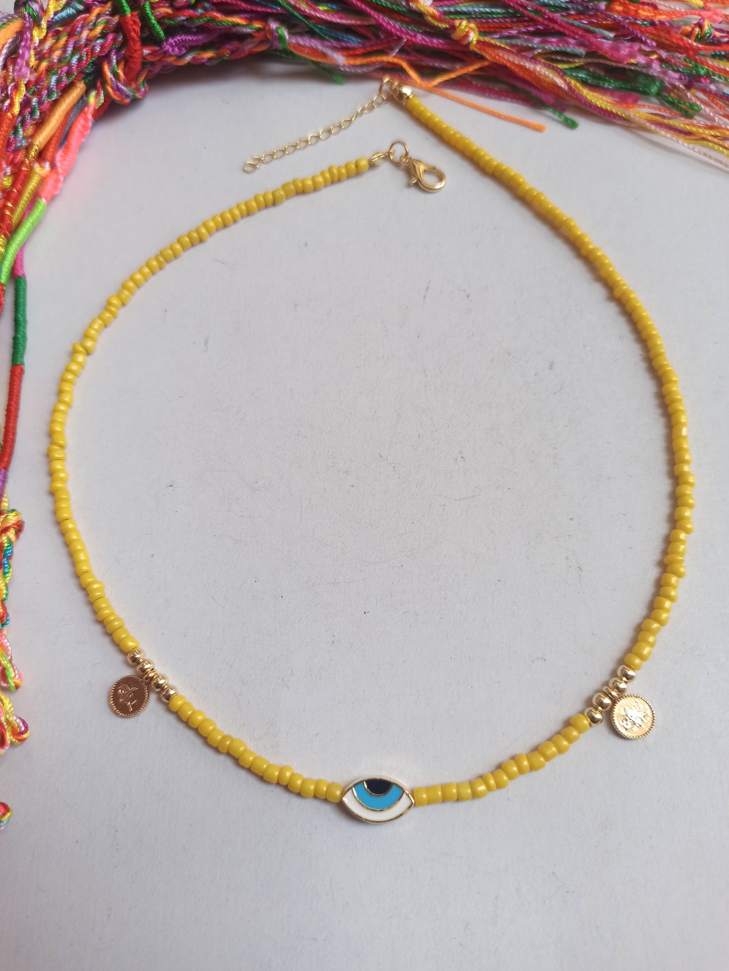 Thin yellow eye necklace