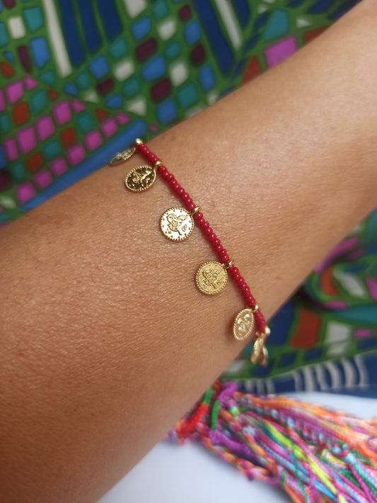 Thin bracelet with dark red coin beads