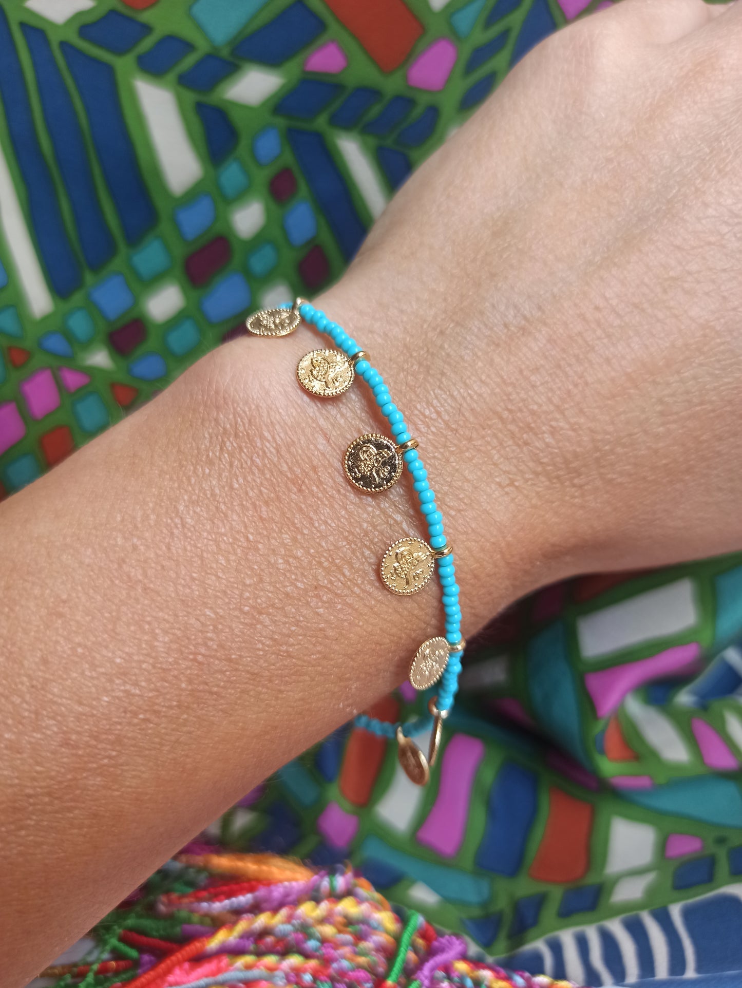 Thin bracelet with turquoise coin beads