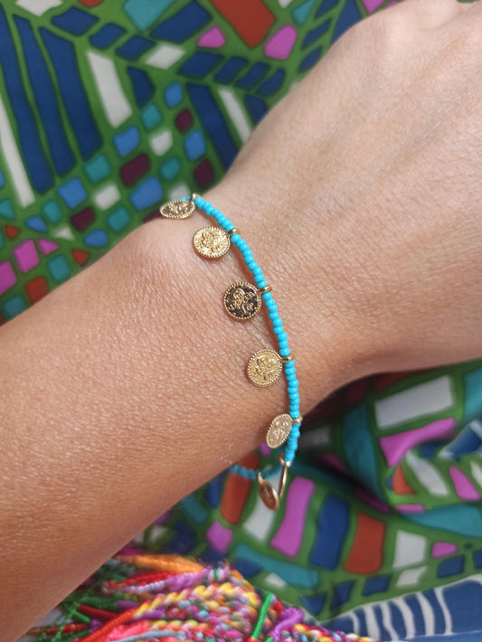 Thin bracelet with turquoise coin beads