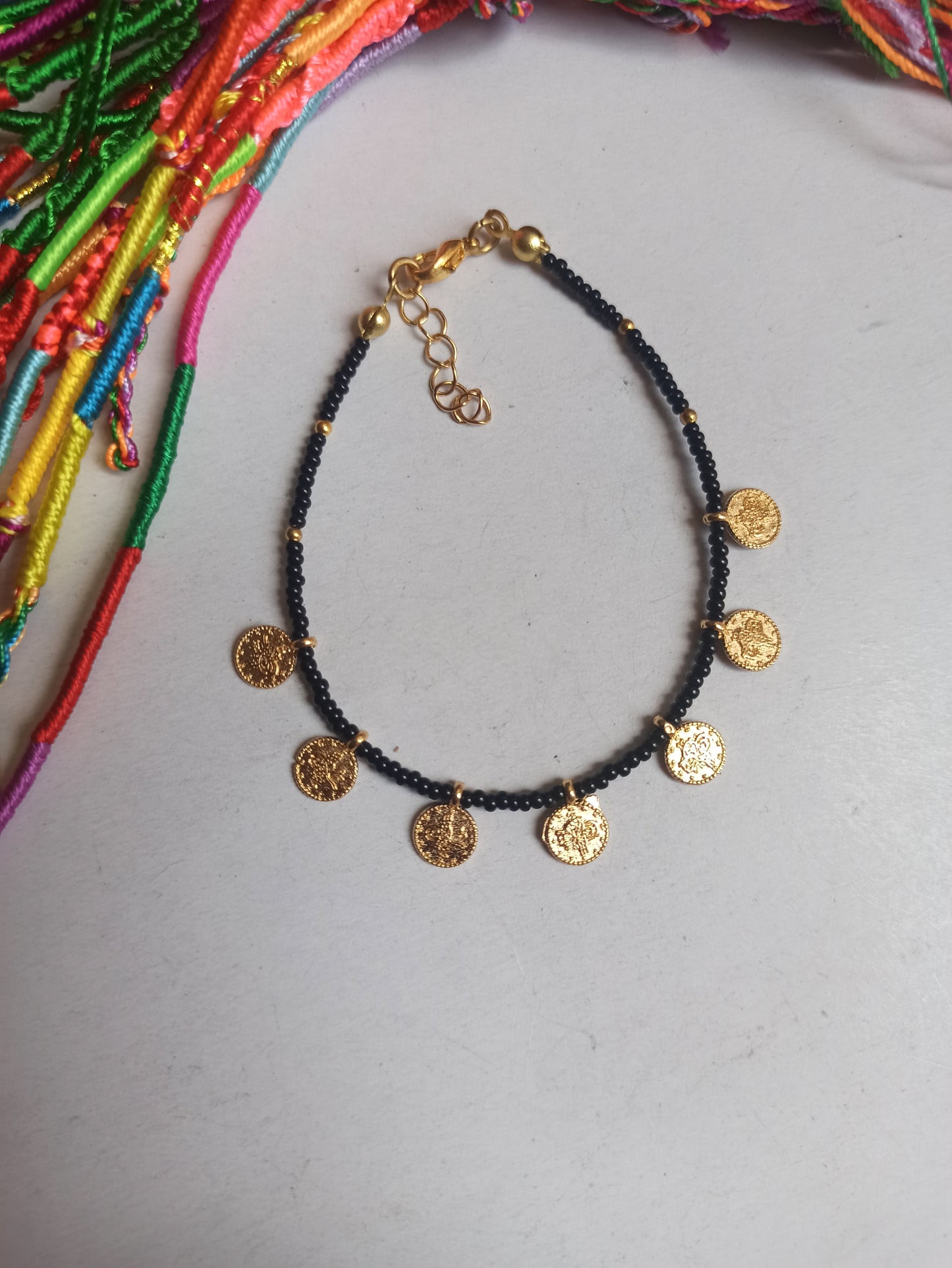 Thin black beaded coin bracelet