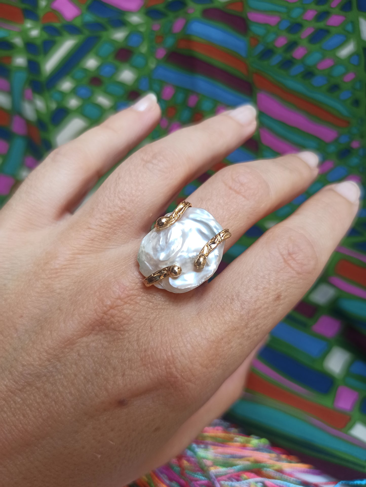 Golden mother-of-pearl ring