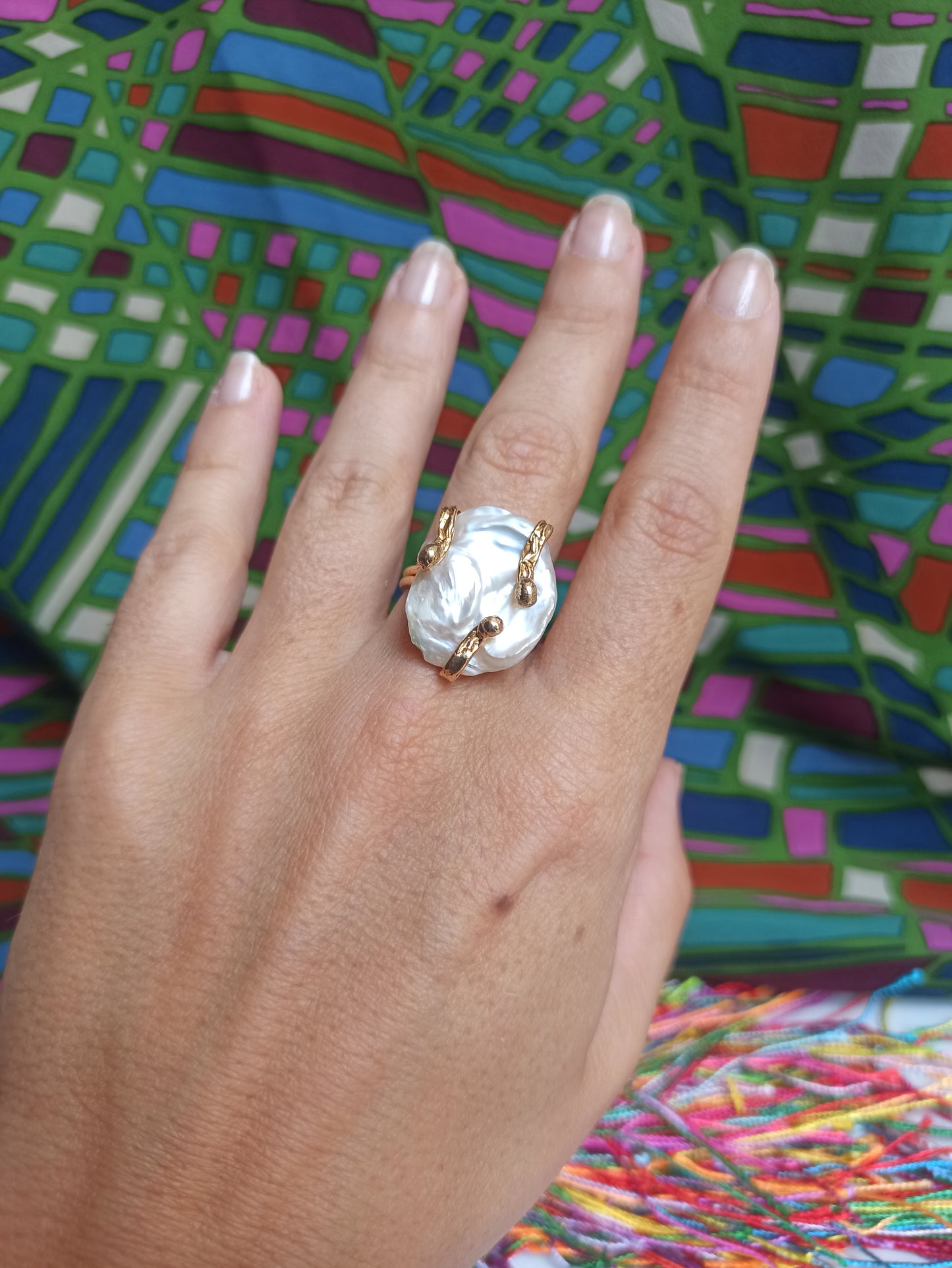 Golden mother-of-pearl ring