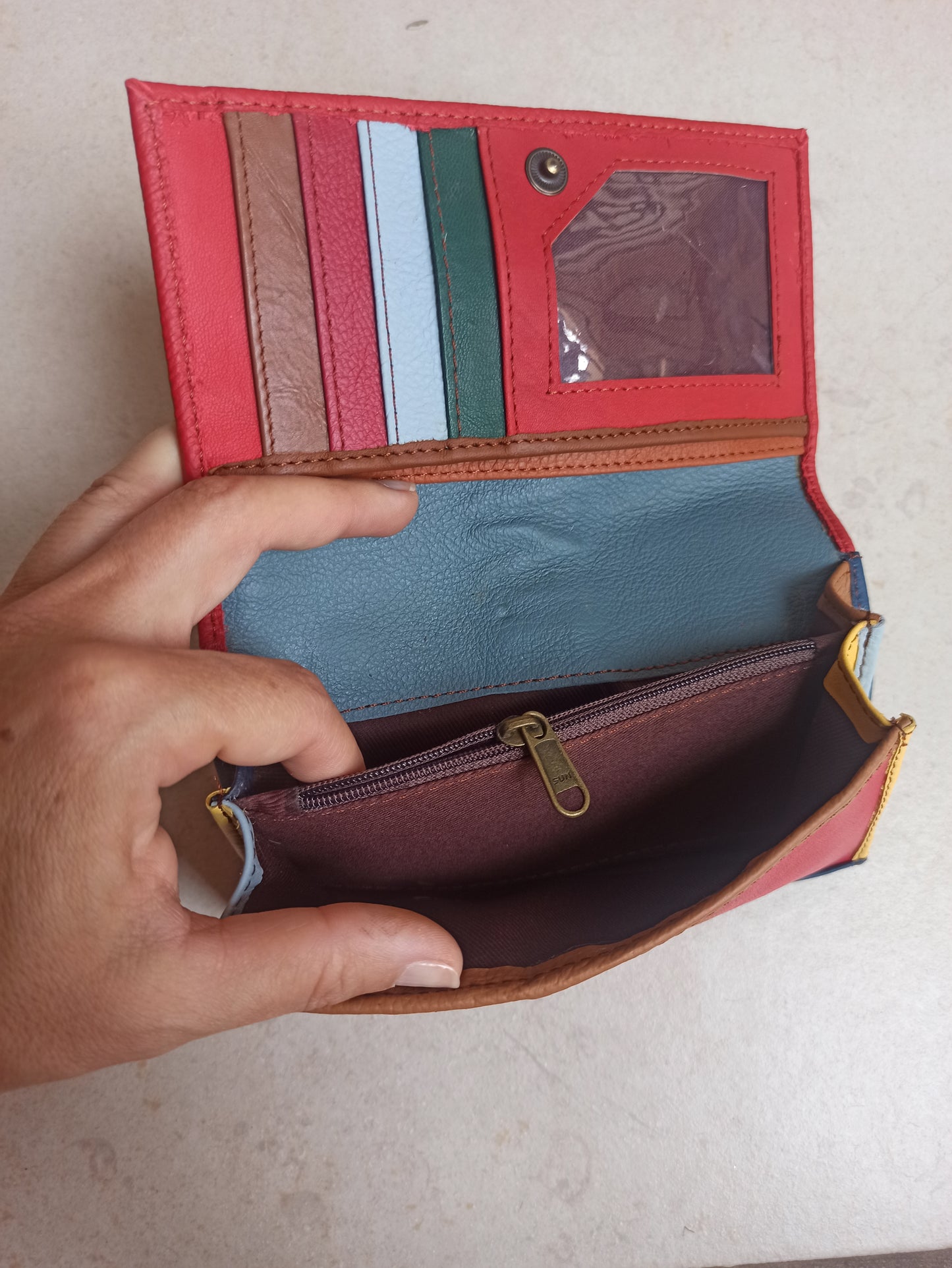 Red and blue leather wallet